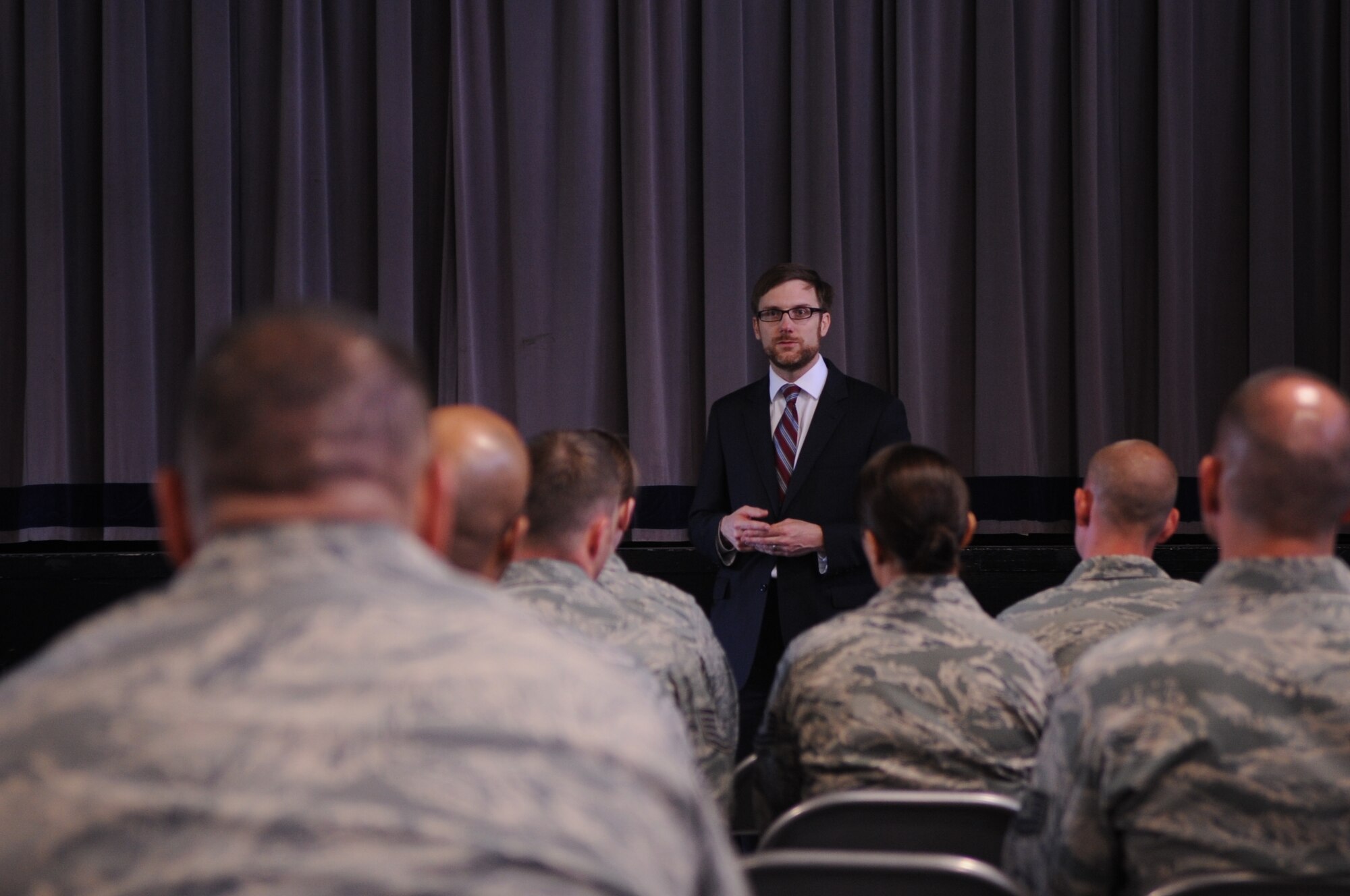 Dr. Jaime Morin, Assistant Secretary of Air Force Financial Management and Comptroller, speaks to members of the 319th Comptroller Squadron during a visit to Grand Forks Air Force Base, N.D., on May 22, 2012. Morin toured the base after serving as the keynote speaker for the 2012 Unmanned Aircraft Systems Summit in Grand Forks city.