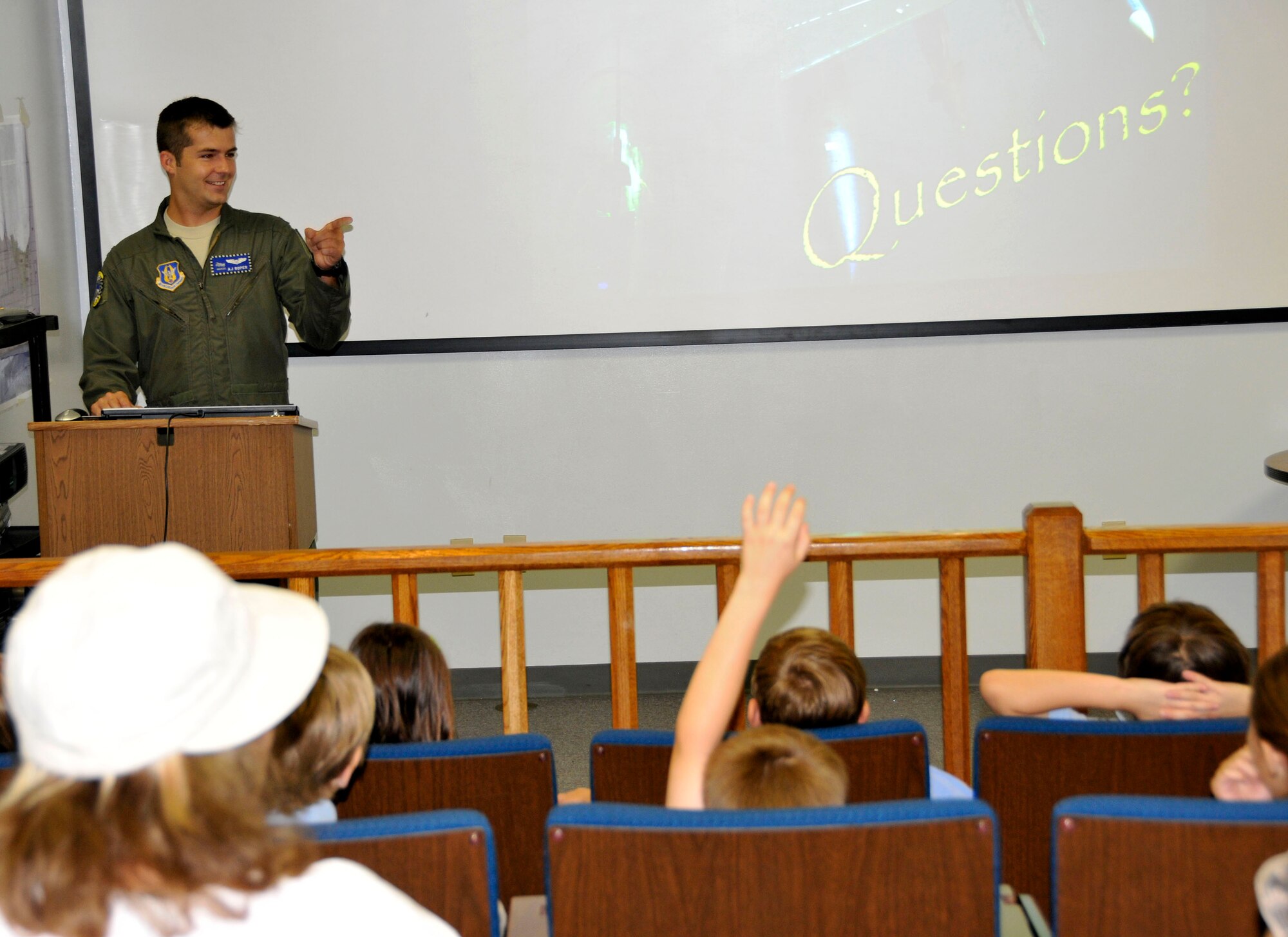 Capt. Albert Roper, 93rd Fighter Pilot, answers questions about being a pilot from first and second-grade students from the Atala Montessori School for Creative Expression during a tour of Homestead Air Reserve Base, May 18. (U.S. Air Force photo by Ross Tweten)