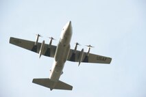 A 910th Airlift Wing C-130H Hercules aircraft performs a flyover during the opening ceremony of a race at Sharon Speedway, May 19, 2012. The event was held in honor of Armed Forces Day. Service members from Youngstown Air Reserve Station and Hermitage National Guard Armory participated in a Joint Service Color Guard to present the colors.