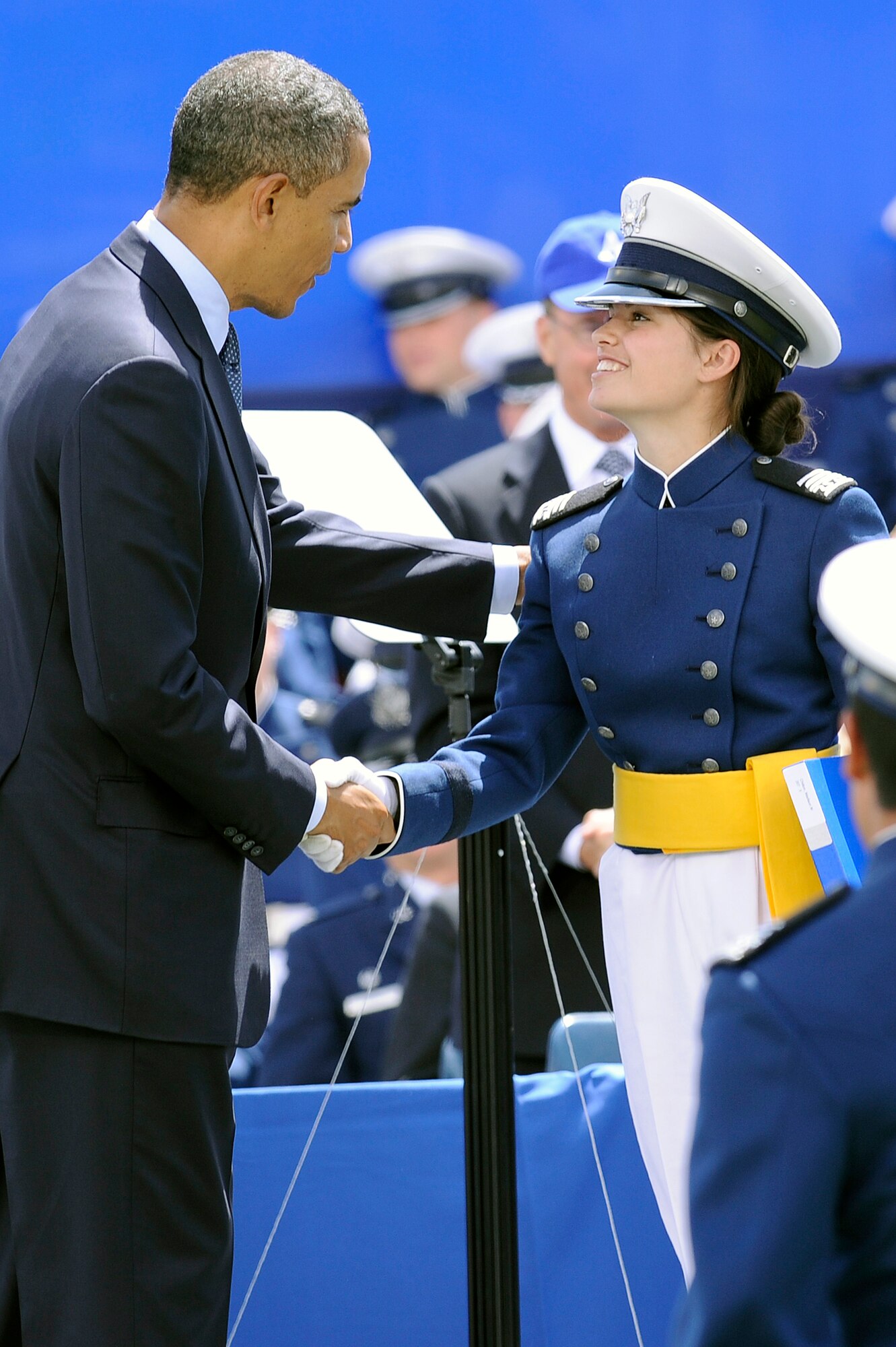 President Barack H. Obama congratulates Cadet 1st Class Madison Chilton during the Air Force Academy graduation ceremony in Falcon Stadium May 23, 2012. Chilton, the daughter of Mobilization Assistant Brig. Gen. Cathy Chilton, is one of a record 237 women to graduate as part of the Academy's Class of 2012. (U.S. Air Force photo/Mike Kaplan)