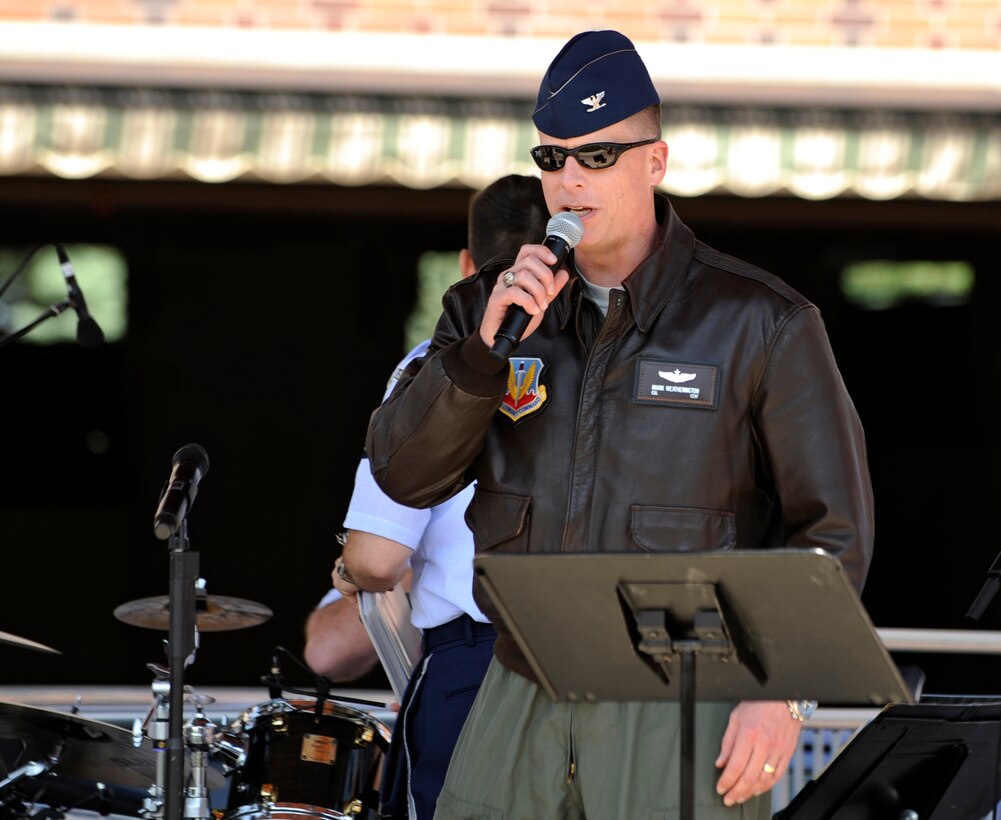 Col. Mark Weatherington, 28th Bomb Wing commander, introduces the U.S. Air Force Heartland of America Band’s pop rock ensemble – Raptor - at Main Street Square in Rapid City, S.D., May 20, 2012. Weatherington extended his appreciation to Rapid City and the surrounding Black Hills area communities for supporting Ellsworth Air Force Base over the past 70 years. (U.S. Air Force photo by Staff Sgt. Marc I. Lane/Released) 