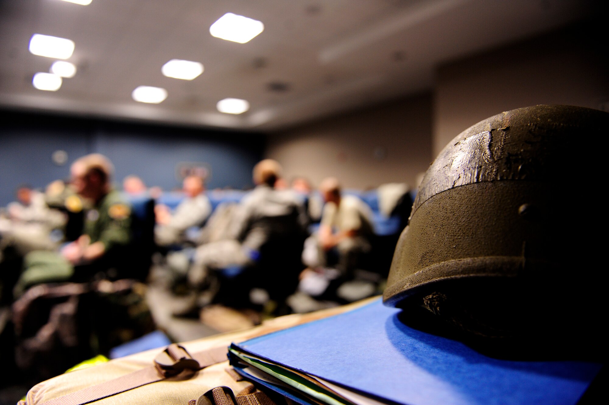 Airmen wait for their pre-deployment briefing during the Operational Readiness Exercise at Shaw Air Force Base, S.C., May 21 to 22, 2012. Just as in a real-world deployment, Airmen are briefed on relevant topics before being deployed to their assigned locations. An ORE prepares Airmen to meet real-world deployment scenarios with speed, accuracy and confidence. (U.S. Air Force photo by Airman Daniel B. Blackwell/Released)