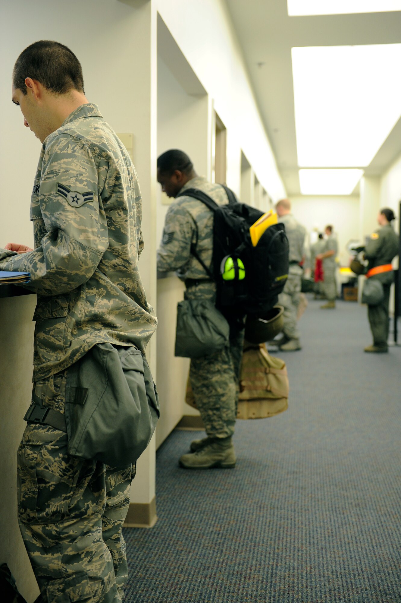 Airmen are processed through the final stations in the line during an Operational Readiness Exercise, Shaw Air Force Base, S.C., May 21 to 22, 2012. Airmen are given the opportunity to ensure their deployment-related affairs are in order prior to deploying.  An ORE prepares Airmen to meet real-world deployment scenarios with speed, accuracy and confidence. (U.S. Air Force photo by Airman Daniel B. Blackwell/Released)