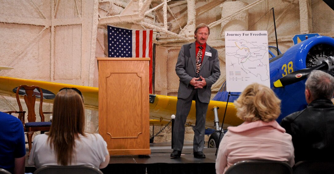 Peter Vodenka, who escaped from behind the Iron Curtain of Communist Czechoslovakia, spoke to visitors about his journey to freedom during a Heritage Day at the South Dakota Air and Space Museum in Box Elder, S.D., May 19, 2012. Vodenka shared what he and his family endured when escaping the bondage of communism in Czechoslovakia during the Cold War. (U.S. Air Force photo by Airman 1st Class Anania Tekurio/Released)