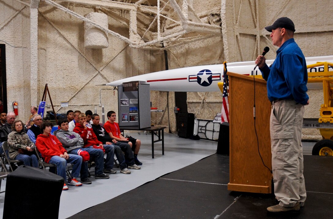 Bob Liebman, Ellsworth Heritage Foundation board member and volunteer, provides opening remarks during Heritage Day at the South Dakota Air and Space Museum in Box Elder, S.D., May 19, 2012. A variety of displays and special demonstrations provided by a variety of agencies, including the 28th Security Forces Squadron military working dog section and the 28th Civil Engineer Squadron Explosives Ordnance Disposal team. (U.S. Air Force photo by Airman 1st Class Anania Tekurio/Released)