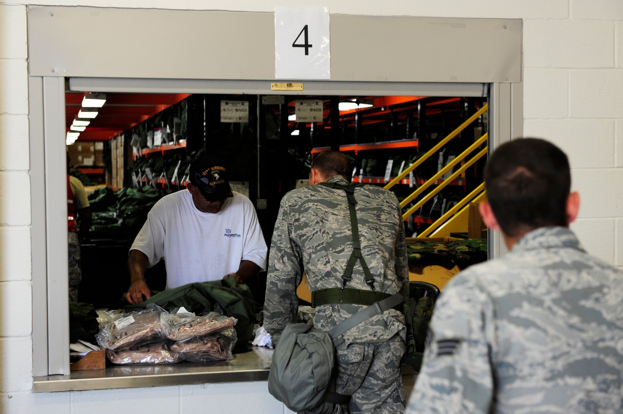 Airmen have their deployment bags checked during an Operational Readiness Exercise, Shaw Air Force Base, S.C., May 21 to 22, 2012. Bags are checked to ensure Airmen have all their necessary items before deploying, to bolster mission success. An ORE prepares Airmen to meet real-world deployment scenarios with speed, accuracy and confidence. (U.S. Air Force photo by Airman Daniel B. Blackwell/Released)