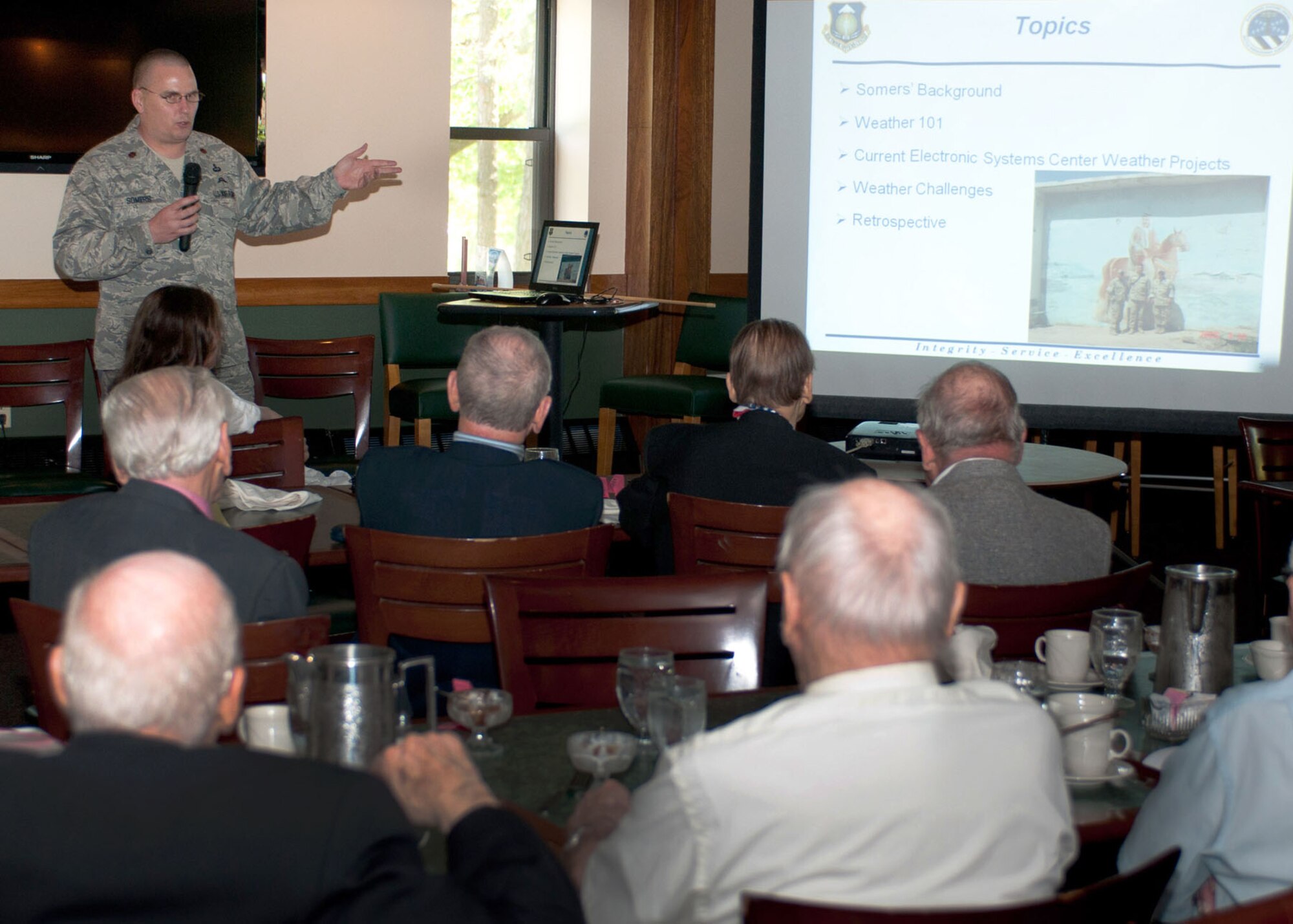 HANSCOM AIR FORCE BASE, Mass -- Maj. Owen Somers, Falcon View Weather program manager, speaks to members of the Eighth Air Force Historical Society at the Minuteman Commons May 17. Somers discussed how the Electronic Systems Center manages its weather programs. (U.S. Air Force photo by Rick Berry)