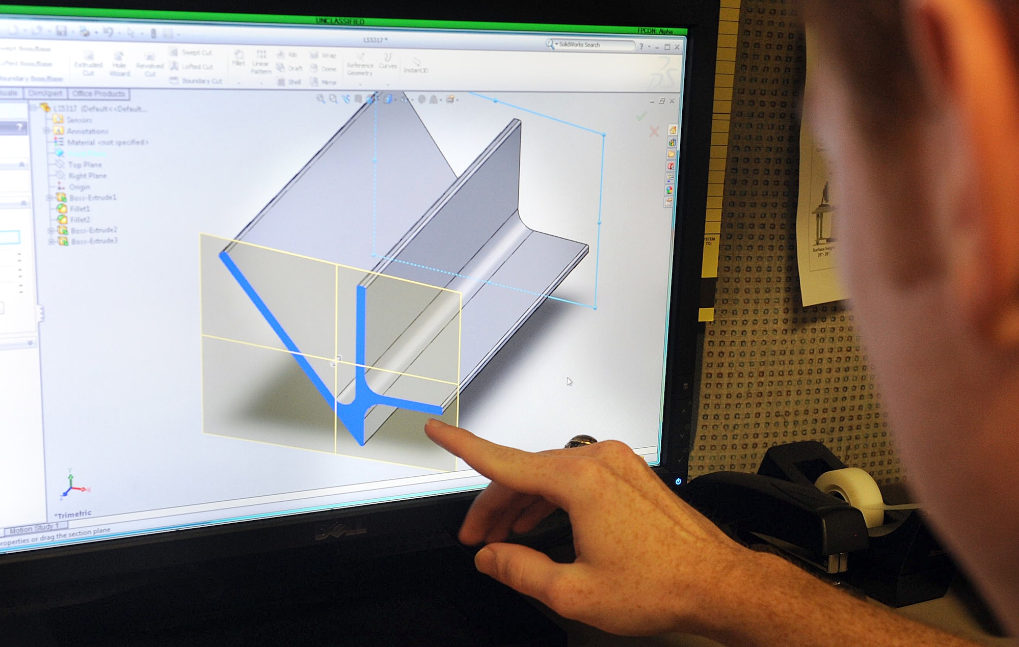 Kevin Phillips, C-130 structural engineer in the Aerospace Sustainment Directorate, examines a C-130 cargo ramp seal retainer drawing to determine if part replacement is necessary. (U.S. Air Force photo by Tommie Horton)