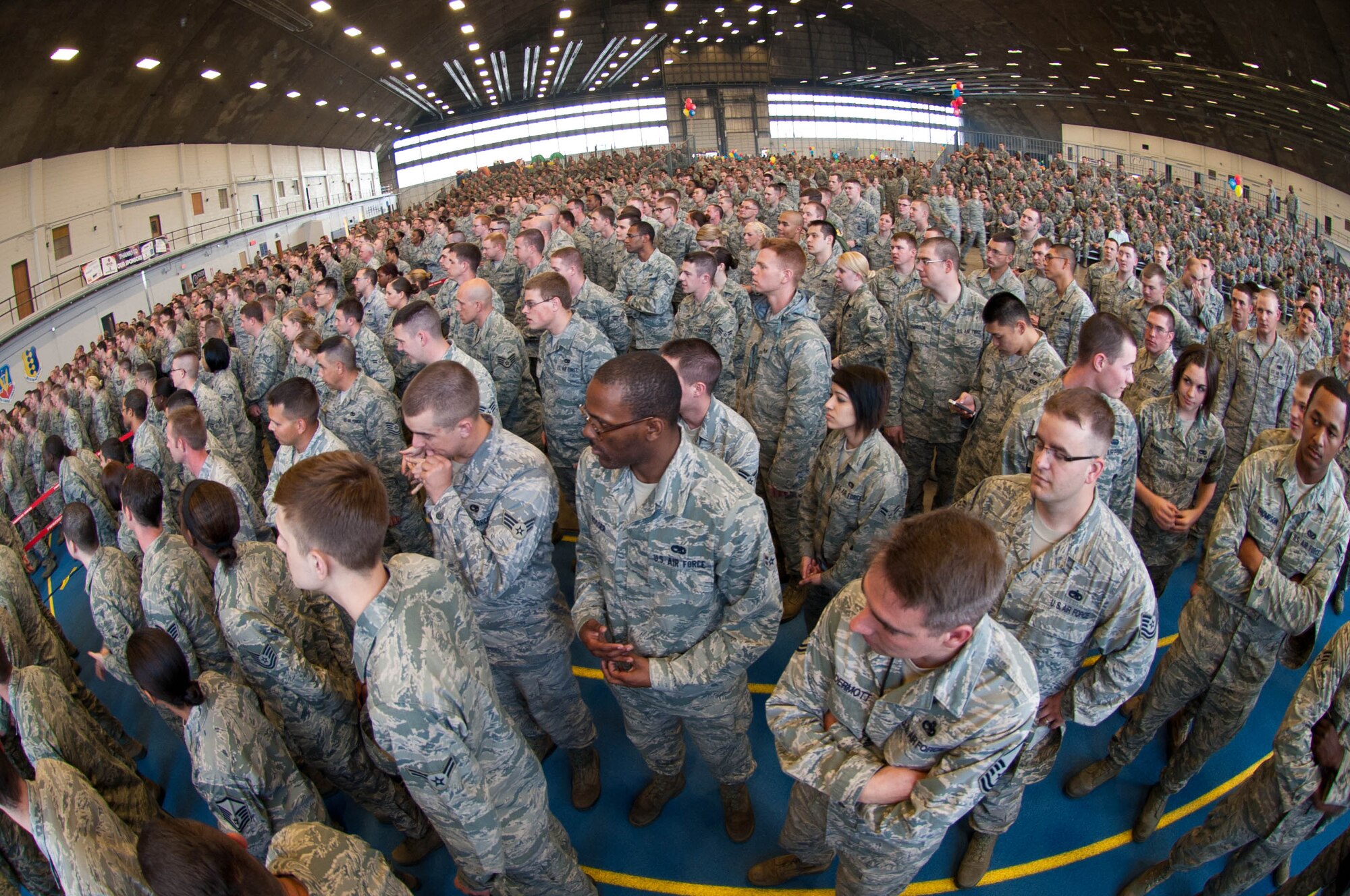 Ellsworth Airmen gather at the Pride Hangar for an Airman’s Call prior to the arrival of Gen. William M. Fraser III, commander of U.S. Transportation Command, at Ellsworth Air Force Base, S.D., May 18, 2012. General Fraser addressed those attending and touched on safety, his past experiences as commander of the 28th Bomb Wing and Ellsworth’s accomplishments. (U.S. Air Force photo by Airman 1st Class Zachary Hada/Released)