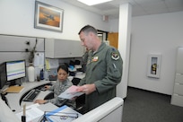 Lt. Col. Ripley Woodard (right), 415th Flight Test Flight commander and Master Sgt. Evangeline Dyer, 415th FLTF aviation resource manager, perform a final operation briefing before taking to the air in a T-38 Talon aircraft May 17 on Joint Base San Antonio-Randolph, Texas. The T-38 is being returned to Sheppard Air Force Base, after modifications were done by the 571st Aircraft Maintenance Squadron here. (U.S. Air Force photo by Rich McFadden) 