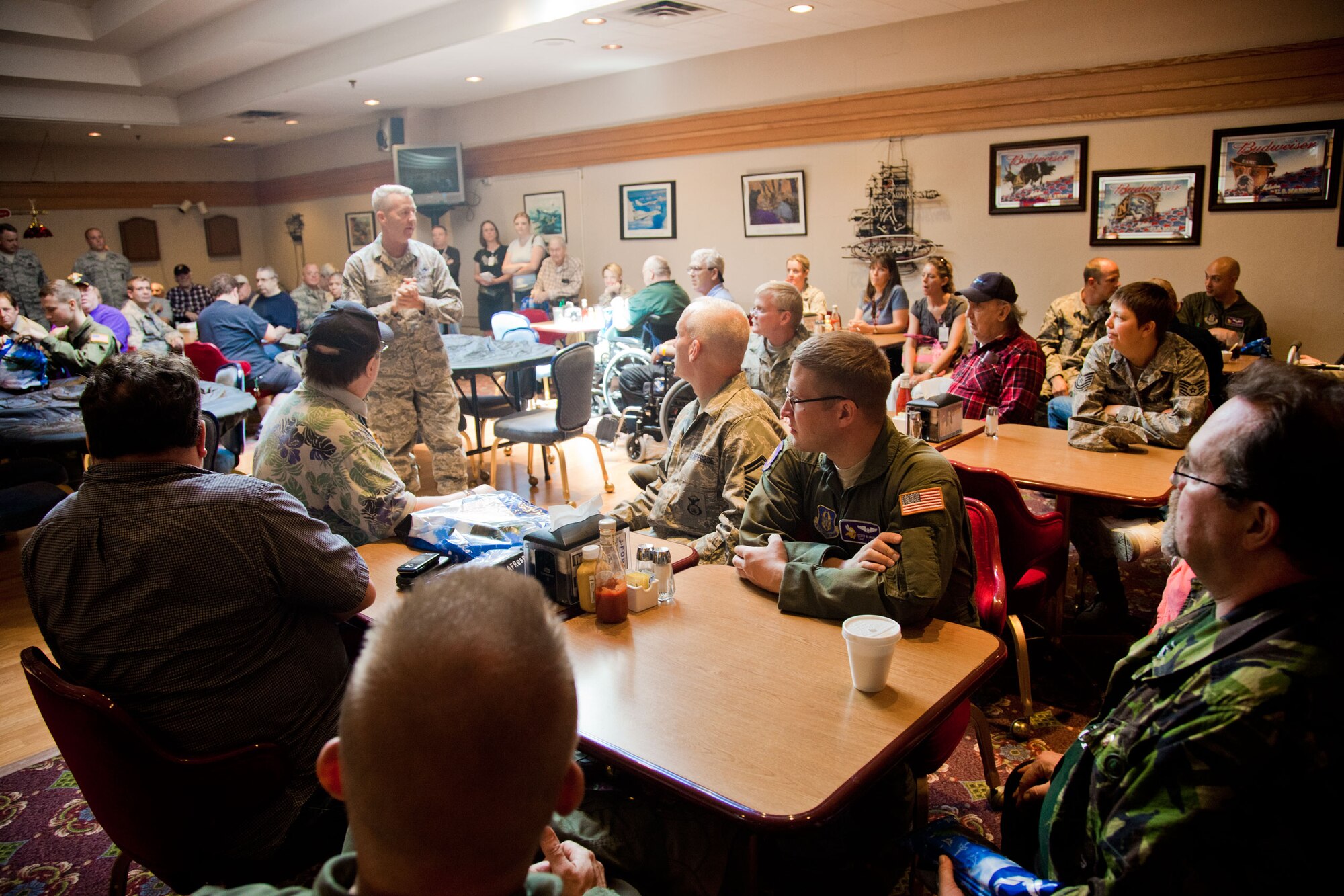 Chief Master Sgt. Michael Rak thanks everyone taking part in the annual Take a Vet to Lunch and for their service.  The 934th Airlift Wing hosted residents of the Minnesota Veterans Homes in Minneapolis and Hastings for an afternoon of lunch, conversation, and tours at the Minneapolis-St. Paul Air Reserve Station, Minn.  (U.S. Air Force Photo/Shannon McKay)