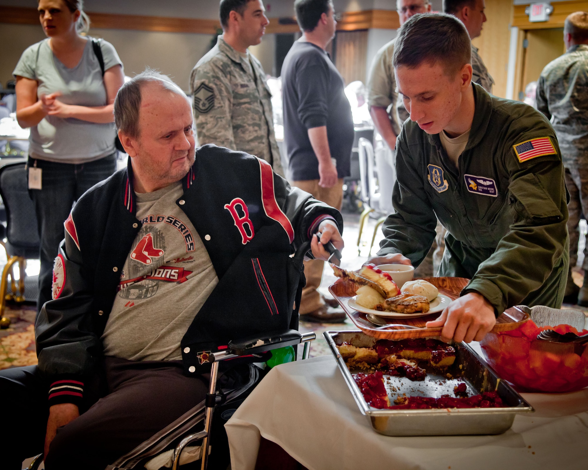 The 934th Airlift Wing hosts residents of the Minnesota Veterans Homes in Minneapolis and Hastings for the annual Take a Vet to Lunch.  Veterans join members of the 934 AW for an afternoon of lunch, conversation, and tours at the Minneapolis-St. Paul Air Reserve Station, Minn.  (U.S. Air Force Photo/Shannon McKay)