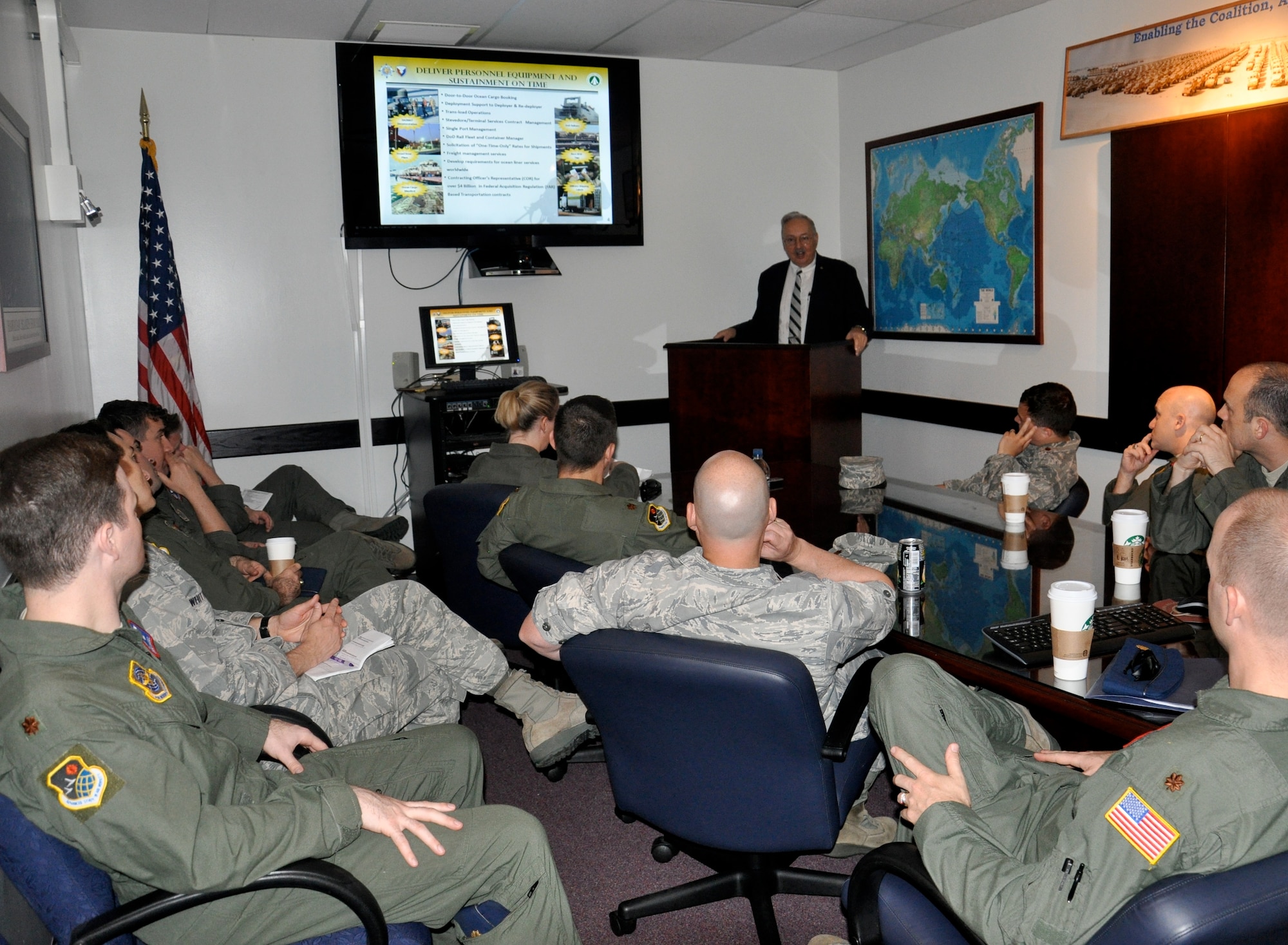 WHEELER ARMY AIR FIELD, Hawaii – Advanced Study of Air Mobility students, from the U.S. Air Force Expeditionary Center located at Joint Base McGuire-Dix-Lakehurst, N.J., learn about Army logistics operations in Hawaii and surrounding areas from Mr. Carlos Tibbetts, of the 599th Transportation Brigade, May 16. The visit was part of a larger tour in which ASAM students discussed various aspects of logistics with military units throughout U.S. Pacific Command. (U.S. Air Force photo by 1st Lt. Sybil Taunton, U.S. Air Force Expeditionary Center public affairs)
