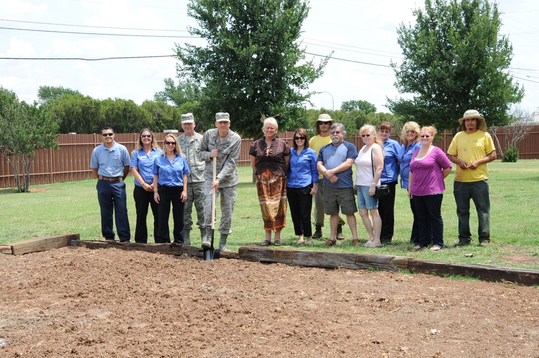 Col. Scott Chowning marks the opening of the Community Garden inside Freedom Estates.  The Community Garden is open to all Sheppard residents who wish to plant garden plants.  (U.S. Air Force Photo/Josh Wilson)