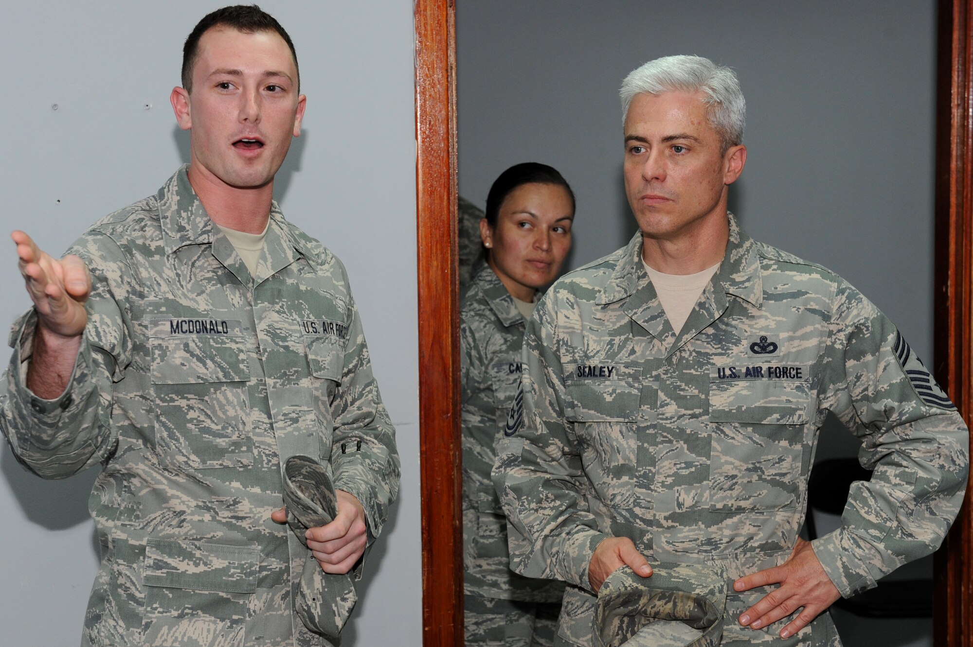 SOUTHWEST ASIA -- Tech. Sgt. David McDonald, 380th Expeditionary Force Support Squadron, shows Chief Master Sgt. Robert Sealey the newly renovated computer room May 21, 2012. Sealey, the U.S. Air Forces Central command chief master sergeant, toured the wing and spoke with several groups of Airmen during his two-day visit. (U.S. Air Force photo/Master Sgt. Scott MacKay)
