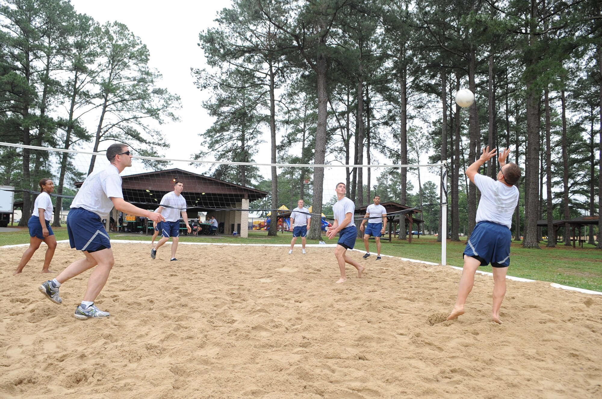 U.S. Air Force Airmen assigned to the 4th Equipment and Aircraft Maintenance Squadrons play volleyball during Warrior Day on Seymour Johnson Air Force Base, N.C., May 21, 2012. Base leaders reminded Airmen to be safe during the critical days of summer. (U.S. Air Force photo/Airman 1st Class Aubrey Robinson/Released)