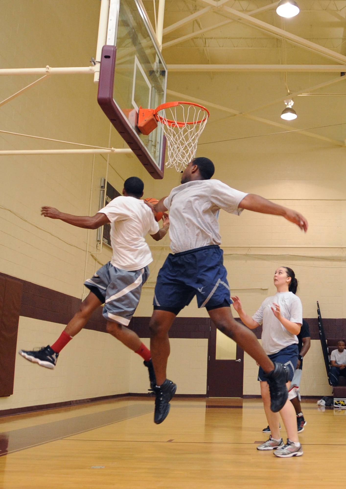 U.S. Air Force Airmen assigned to the 4th Equipment Maintenance and Force Support Squadrons play basketball during Warrior Day on Seymour Johnson Air Force Base, N.C., May 21, 2012. Airmen came together for a day of friendly competition to kick-off the critical days of summer. (U.S. Air Force photo/Airman 1st Class Aubrey Robinson/Released)