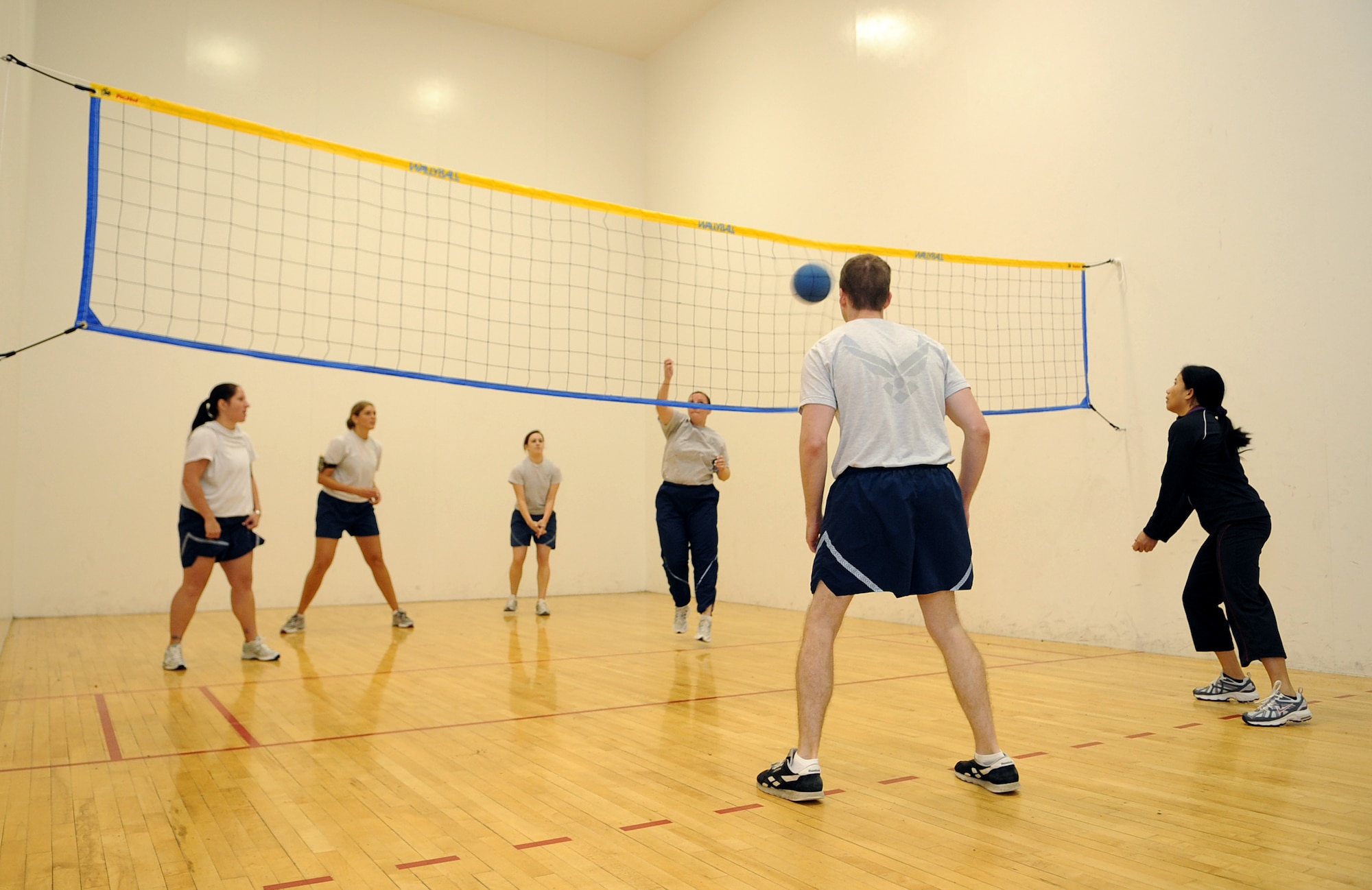 U.S. Air Force Airmen assigned to the 4th Aerospace Medicine Squadron play wallyball during Warrior Day on Seymour Johnson Air Force Base, N.C., May 21, 2012. Airmen from various squadrons around base participated in several sporting events to boost morale and encourage teamwork. (U.S. Air Force photo/Airman 1st Class Aubrey Robinson/Released)