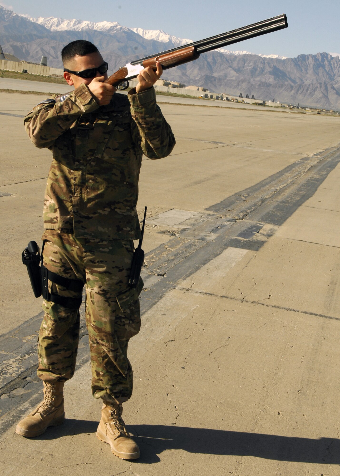 Tech. Sgt. Vincent Garcia, 455 AEW Flight Safety noncommissioned officer in charge, simulates bird depredation on Bagram Airfield to mitigate bird strike hazards with aircraft. Garcia was presented the Warrior of the Week award for his outstanding performance as maintenance investigating member in charge of mishap reports for higher headquarters. Garcia developed and implemented the wing's flight safety program, to include operational risk management, trend analysis and spot inspections. His expert knowledge of safety regulations and local requirements are reflected in reduced mishap rates across the entire airfield and on various combat airframes. (U.S. Air Force photo/Staff Sgt. Jeff Nevison)