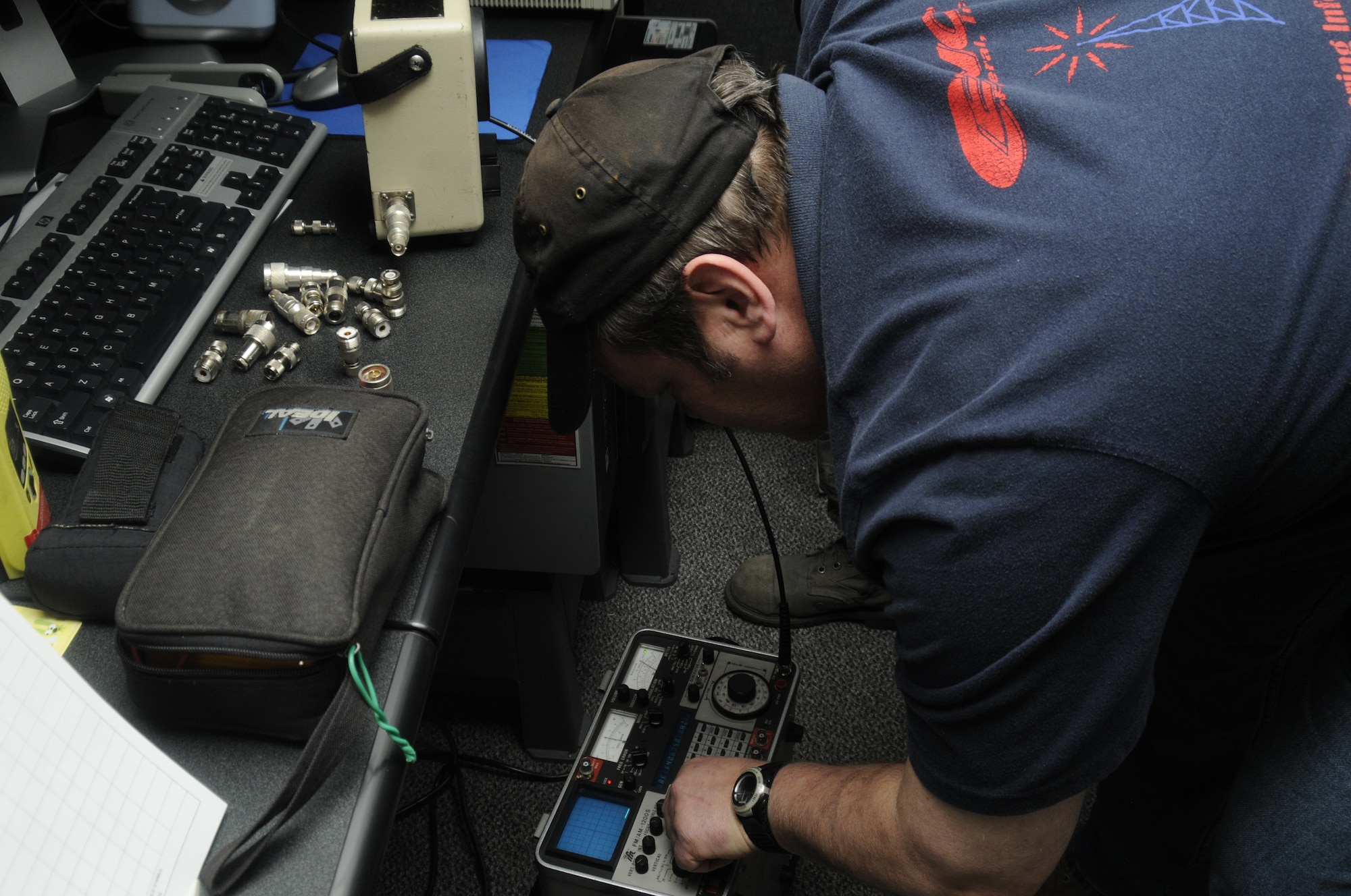 Fred Long, 35th Communication Squadron radio frequency technician, works with a communication system analyzer at Misawa Air Base, Japan, May 22, 2012. The analyzer is used to check the frequency of radios being worked on, as well as tune and adjust radio systems. This PWCS project included working on a base station at the base’s Airfield Operations. (U.S. Air Force photo by Airman 1st Class Zachary Kee/ Released)