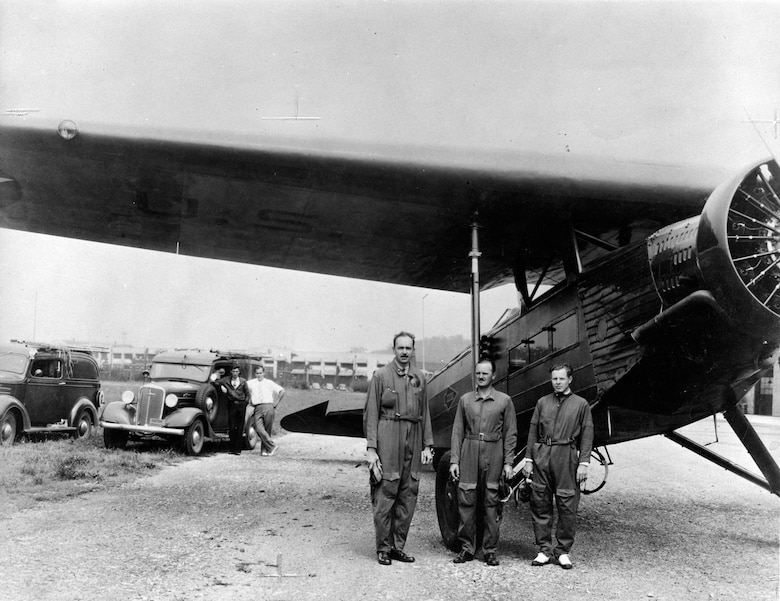 The three occupants of the C-14B and their plane, which made history's first automatic landing, were Capt. Carl J. Crane, who invented the system, Capt. George V. Holloman, who flight tested it, and Mr. Raymond Stout, a Wright Field civilian electronic engineer who assisted in developing the system. (U.S. Air Force photo)