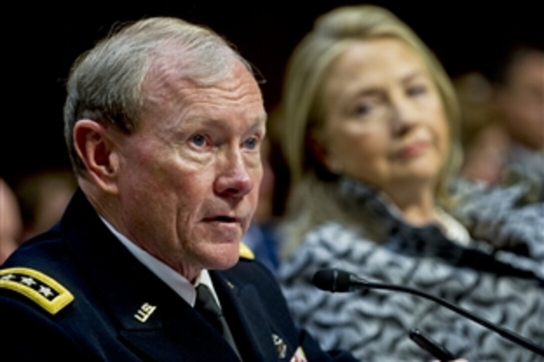 Army Gen. Martin E. Dempsey, chairman of the Joint Chiefs of Staff, testifies on the Law of the Sea Convention before the Senate Foreign Relations Committee as Secretary of State Hillary Rodham Clinton looks on in Washington, D.C., May 23, 2012.