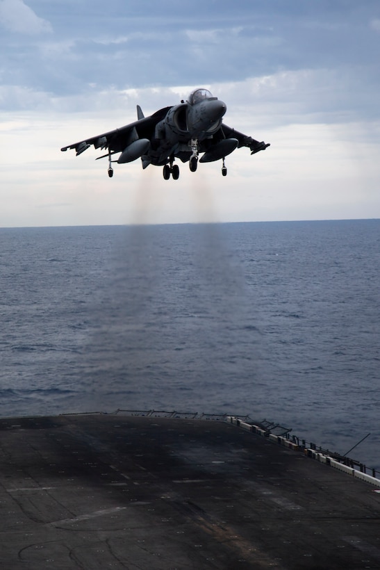 A pilot flying an AV-8B Harrier lands aboard USS Makin Island here May 23. The pilot serves with Marine Medium Helicopter Squadron 268 (Reinforced), the aviation combat element of the 11th Marine Expeditionary Unit. The unit embarked the ship, as well as USS New Orleans and USS Pearl Harbor in San Diego Nov. 14, beginning a seven-month deployment to the Western Pacific, Horn of Africa and Middle East regions.