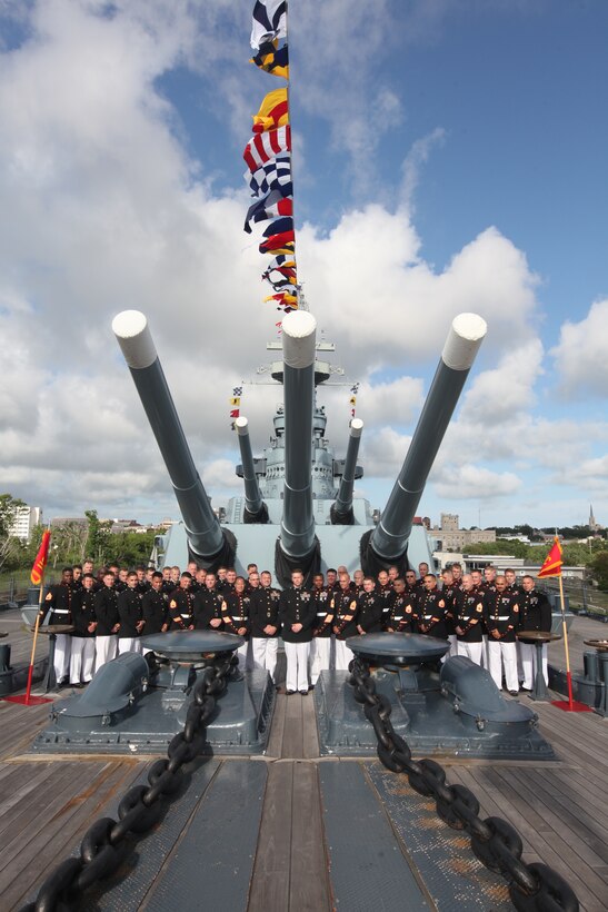 More than 50 officers and staff noncommissioned officers with Heavy Helicopter Squadron 366 pose for a photo aboard the USS North Carolina in Wilmington, N.C., before the units mess night May 24. The squadron has Marines deployed to the Horn of Africa, in Afghanistan and will be sending a third detachment to join the 24th Marine Expeditionary Unit in the upcoming months. Since the squadron is never at 100 percent, the commanding officer felt, with a majority of the unit’s officers and staff noncommissioned officers home for a brief moment, that this would be the best time for the unit to conduct the mess night.