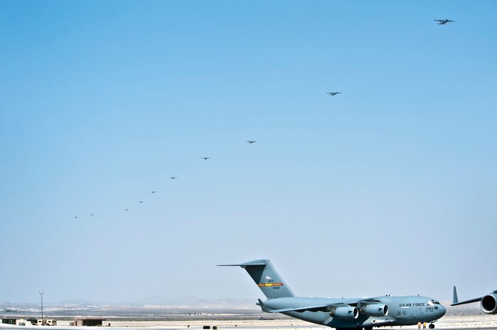A C-17 Globemaster III assigned to the 97th Air Mobility Wing, Altus Air Force Base, Okla., taxis on the Nellis flight line after participating in the U.S. Air Force Weapons School Mobility Air Forces Exercise over the Nevada Test and Training Range May 23, 2012. The exercise, involving 22 C-17 and 29 C-130 Hercules aircraft, and 820th RED HORSE Squadron civil engineers, simulated seizure of a landing site in hostile territory. (U.S. Air Force photo by Lawrence Crespo)