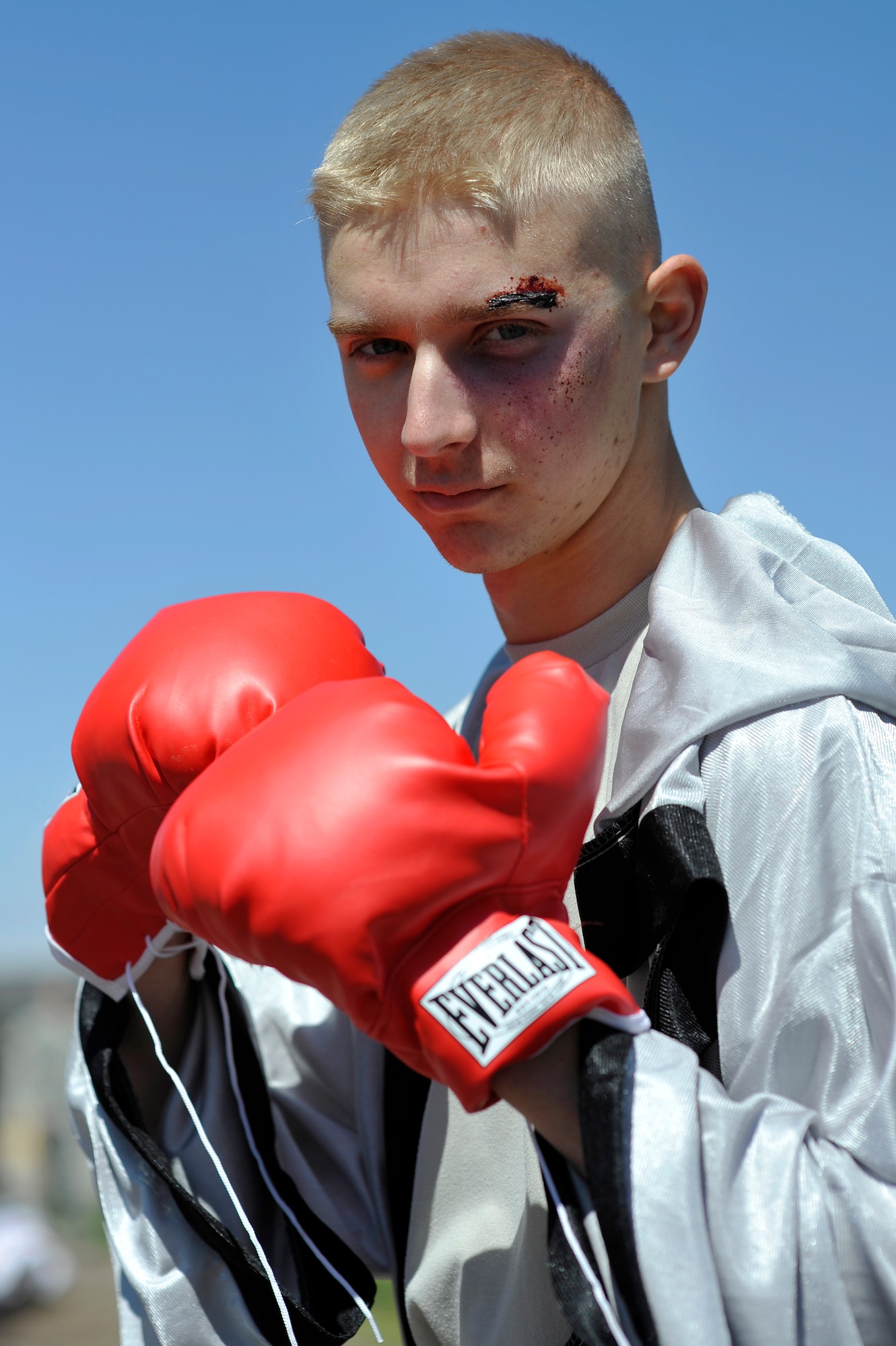 BUCKLEY AIR FORCE BASE, Colo. -- Airman 1st Class Dylan Williams, 460th Space Communications Squadron, poses as a boxer here May 24, 2012. The costume was part of the festivities at Team Buckley's Post-Operational Readiness Inspection Party. (U.S. Air Force photo by Staff Sgt. Kathrine McDowell)