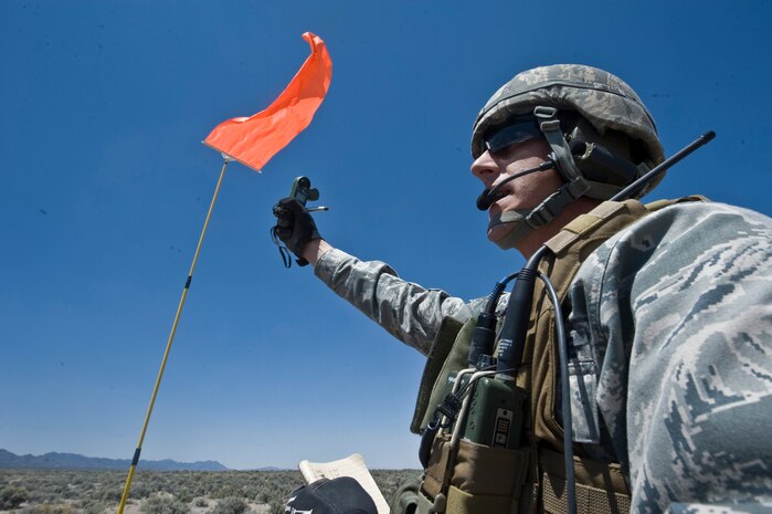 A U.S. Air Force Tech. Sgt. Kellen Buss, use anemometers to measure wind speed during a Mobility Air Force Exercise May 23, 2012, on the Nevada Test and Training Range. RED HORSE can rapidly deliver small specialized teams and equipment packages by airdrop or air insertion to conduct expedient airfield repairs. (U.S. Air Force photo by Airman 1st Class Daniel Hughes)