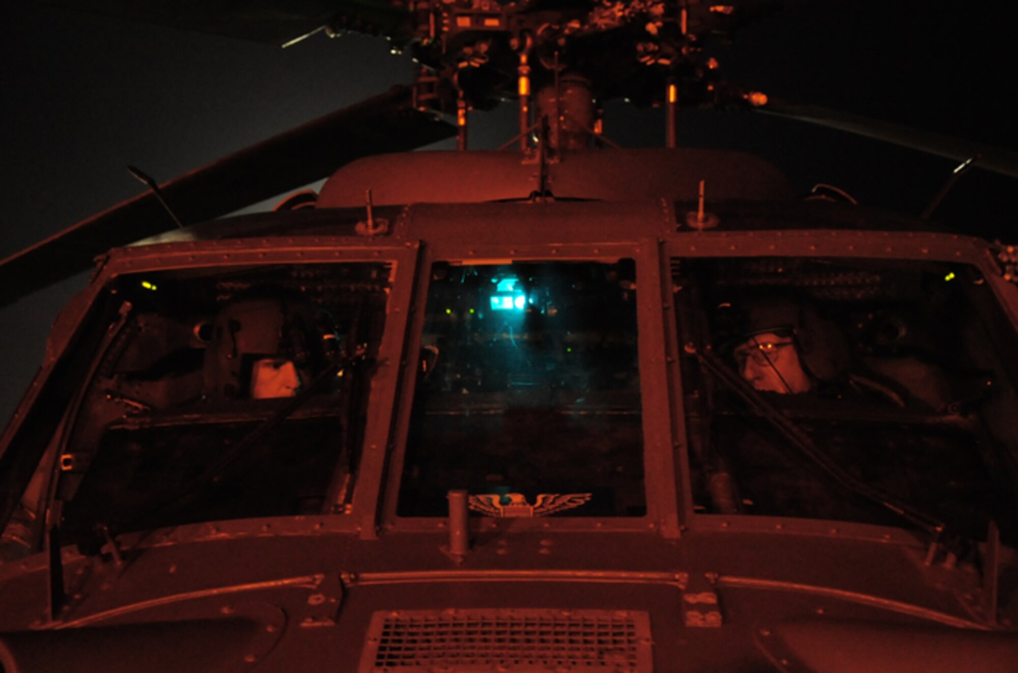 Pilots, Capt. Paul Carpenter and Col. Jeffrey Macrander, also the 920th Rescue Wing Commander, Patrick Air Force Base, Fla., ready an HH-60G Pave Hawk helicopter for flight May 22. Aircrew Airmen flew through the night to clear the range prior to the milestone SpaceX Technologies Falcon 9 rocket launch, which will be the first commercial launch to the International Space Station. Rescue Wing Airman have supported rocket launches, manned and unmanned, for the past 50 years. They are on hand to secure the Eastern Range prior to every Space Coast launch. (U.S. Air Force photo/Capt. Cathleen Snow)