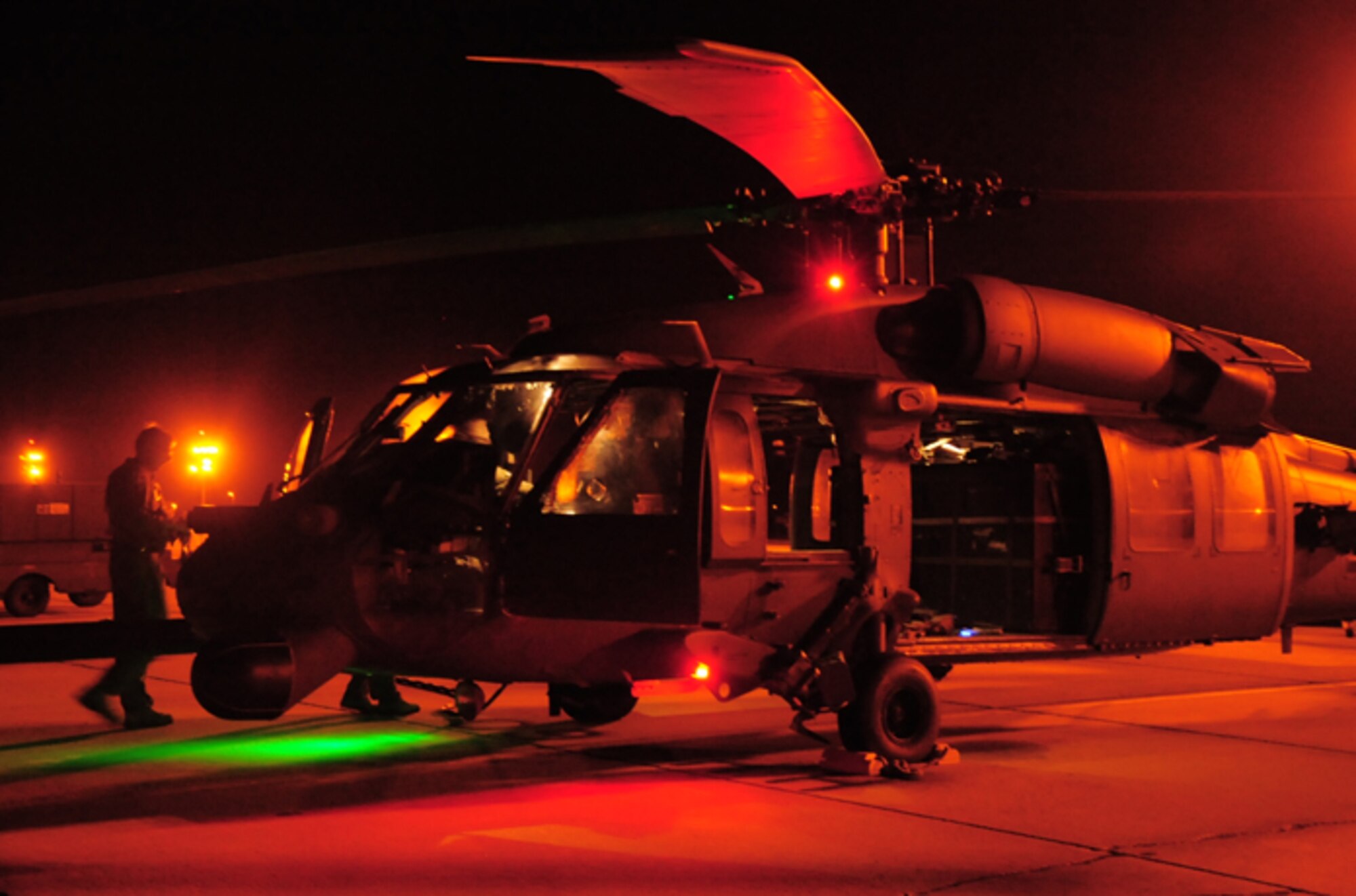 Airmen from the 920th Rescue Wing, Patrick Air Force Base, Fla. ready an HH-60G Pave Hawk helicopter for flight May 22. Aircrew Airmen flew through the night to clear the range prior to the SpaceX Technologies Falcon 9 rocket launch, which will be the first commercial launch to the International Space Station. (U.S. Air Force photo/Capt. Cathleen Snow)