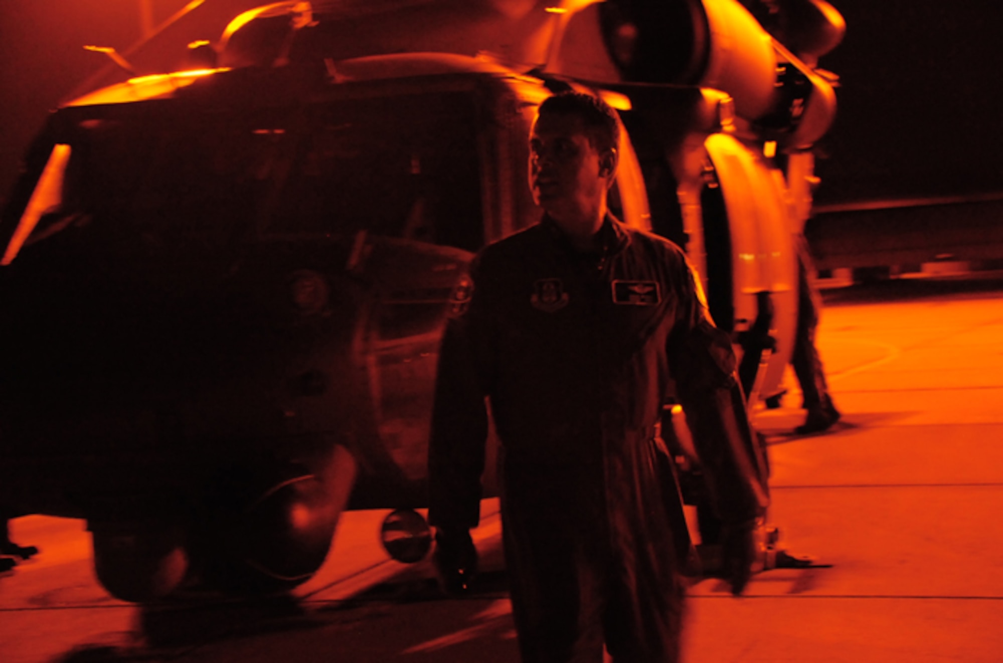 Senior Master Sgt. Omar Rivera, helicopter aerial gunner, 920th Rescue Wing, Patrick Air Force Base, Fla. readies an HH-60G Pave Hawk helicopter for flight May 22. He and his aircrew team flew through the night to clear the range prior to the SpaceX Technologies Falcon 9 rocket launch. (U.S. Air Force photo/Capt. Cathleen Snow)