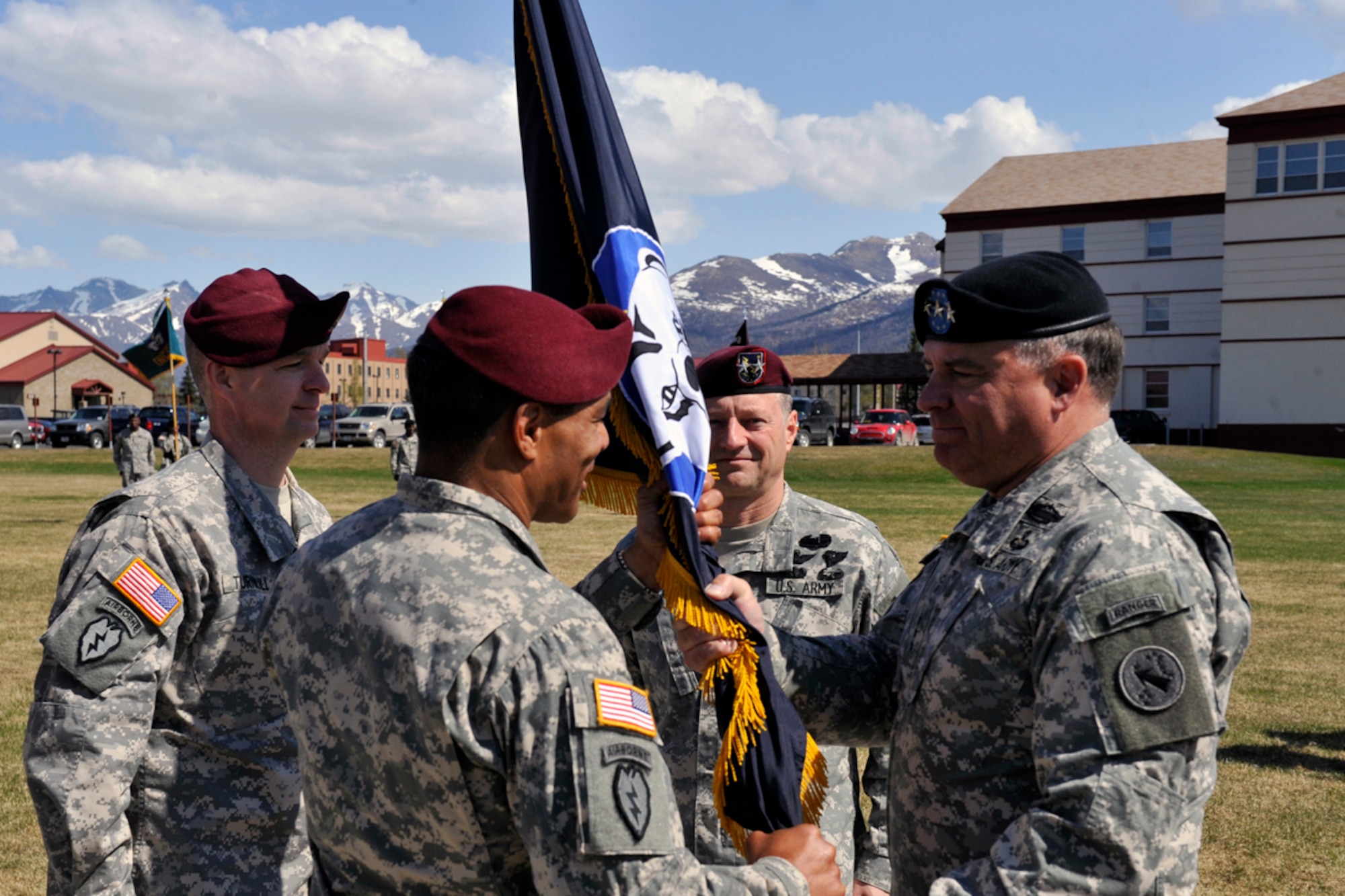 JOINT BASE ELMENDORF-RICHARDSON -- U.S. Army leadership perform the change of command's passing of the guidon welcoming United States Army Alaska's new commanding general, Maj. Gen. Michael Garrett, May 17. Garrett's previous assignments include command at the platoon, battalion and brigade level and staff assignments at company through corps level. (U.S. Air Force photo/ Airman 1st Class Ty-Rico Lea)