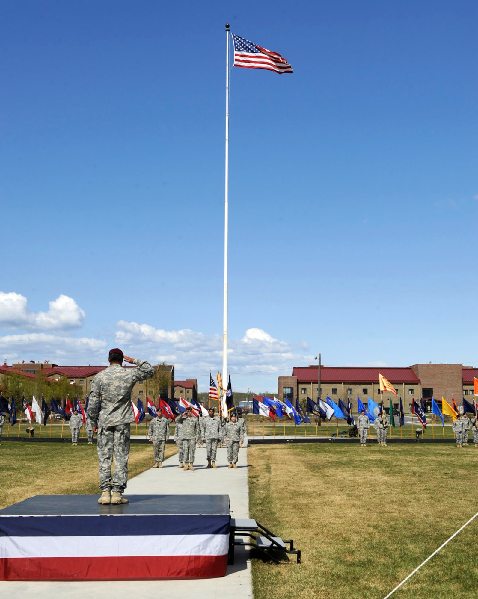 JOINT BASE ELMENDORF-RICHARDSON,Alaska -- Army Maj. Gen. Michael Garrett salutes his new command during the U.S. Army Alaska change of command ceremony. Garrett replaced Maj. Gen. Raymond Palumbo, who will be transferring to the Pentagon.  (USAF Photo by Steven White/JBER PA)