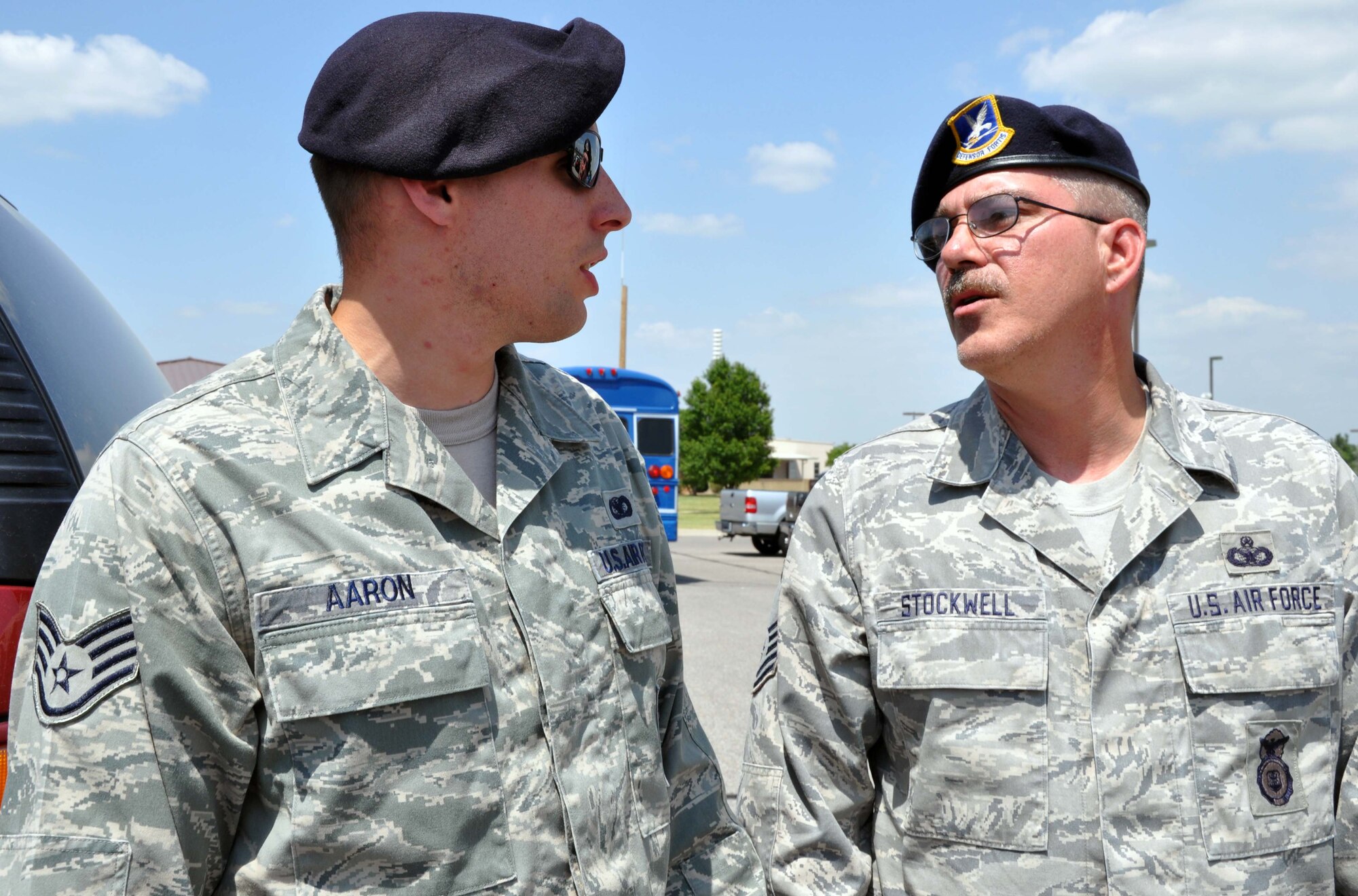Master Sgt. William Stockwell, 931st Security Forces Squadron, welcomes Staff Sgt. Joseph Aaron back to McConnell Air Force Base, Kan., after Aarron returned a 12-day temporary duty assignment at March Air Reserve Base, Calif.,  May 24, 2012.  Aaron was one of 23, 931 SFS members who augmented the 452nd Air Mobility Wing's SFS to assist with security and crowd control during the "March Field Airfest 2012" air show at March ARB. (U.S. Air Force photo by 1st Lt. Zach Anderson)