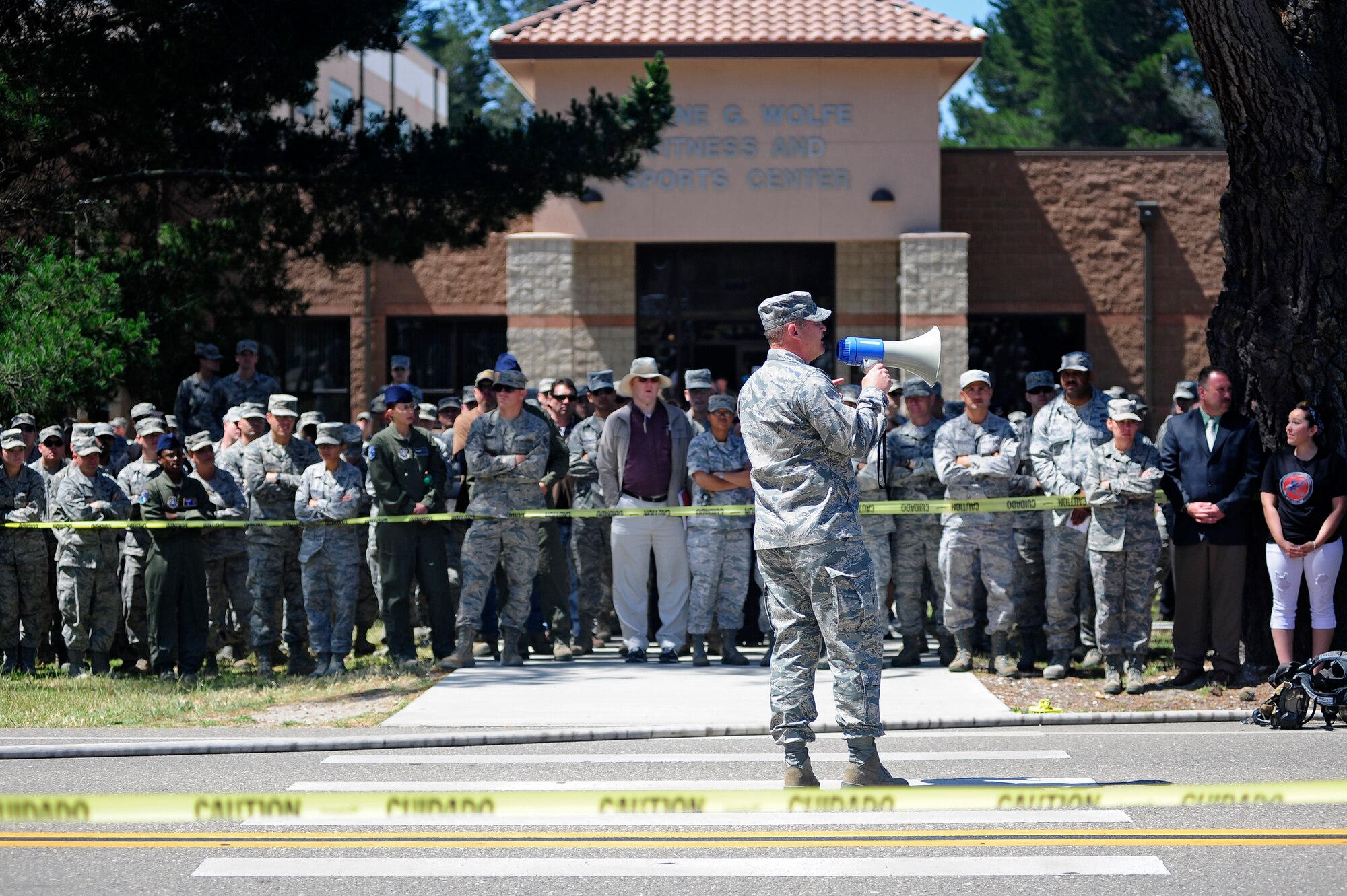 VANDENBERG AIR FORCE BASE, Calif. -- Col. Matthew Carroll, 30th Space Wing chief of wing safety, urges Team V members to drink responsibly and think safety after witnessing a staged drunk driving accident in front of the Base Fitness Center here Thursday, May 24, 2012. Airmen Against Drunk Driving teamed up with Vandenberg first responders to give base personnel a firsthand experience with the immediate consequences of impaired driving. This event concluded a week of outreach activities to raise awareness on the importance of safety during the Critical Days of Summer. (U.S. Air Force photo/Michael Peterson)
