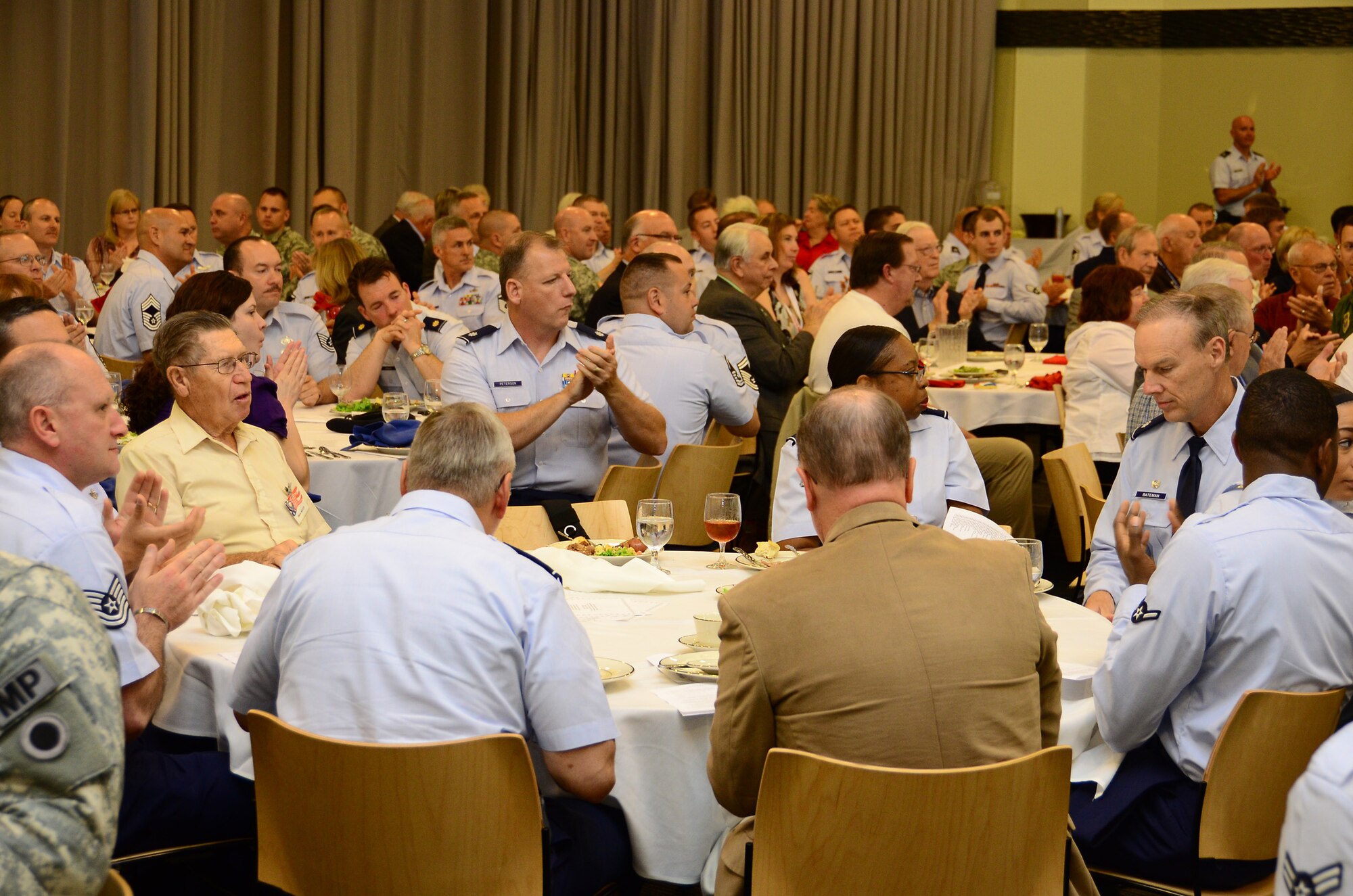 WRIGHT-PATTERSON AIR FORCE BASE, Ohio – Reservists from the 445th Airlift Wing joined more than 235 guests participating in the 31st Annual Springfield-Clark County Armed Forces Day luncheon in Springfield, Ohio, May 7. The luncheon, sponsored by the Springfield Rotary Club, Springfield Kiwanis Club, Springfield Exchange Club and the Miami Valley Military Affairs Association, is held annually to recognize and honor area military units, installations and assigned personnel who serve the Springfield-Clark County community, the State of Ohio and the United States. (U.S. Air Force photo/Staff Sgt. Mikhail Berlin)