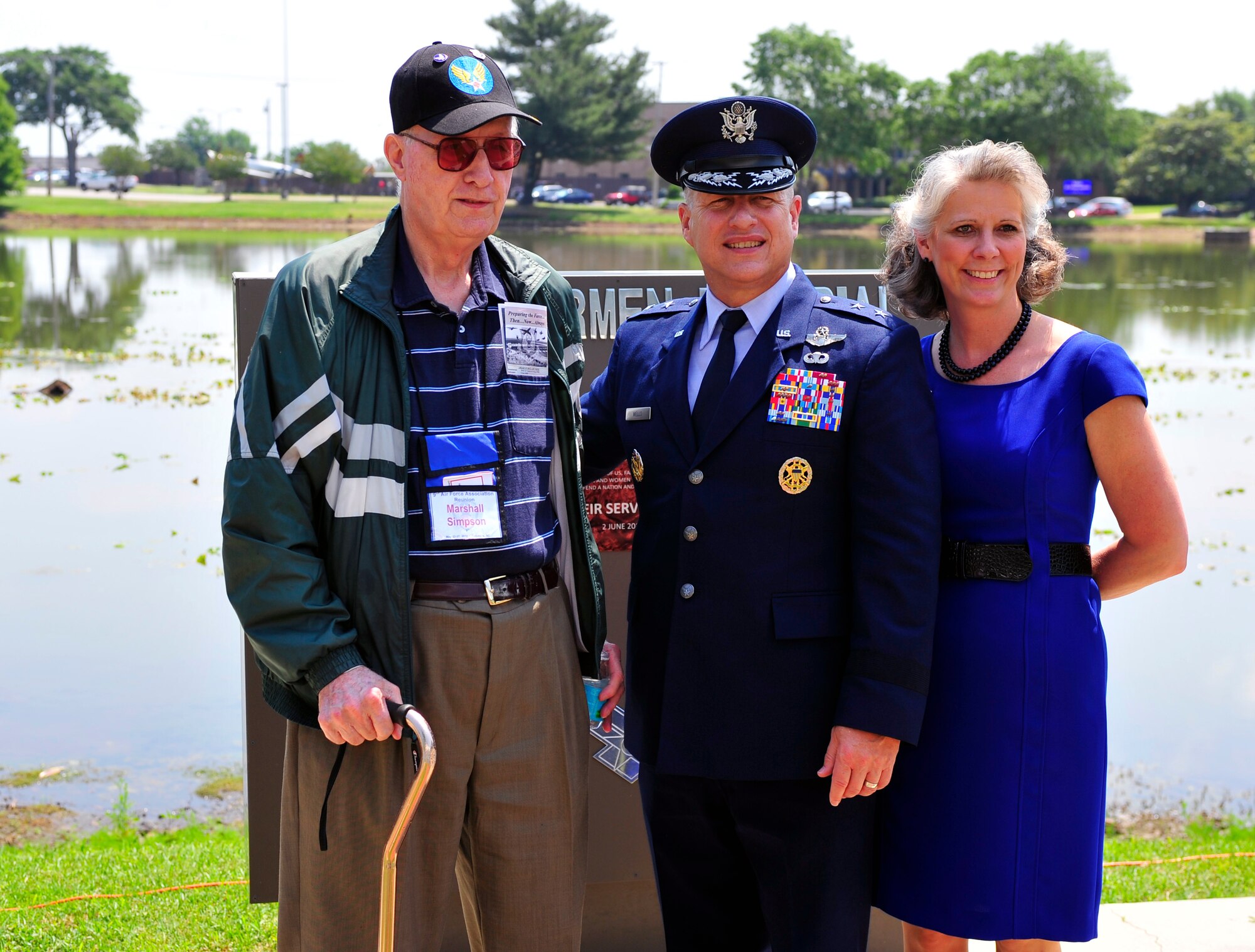 U.S. Air Force Maj. Gen. Lawrence Wells, 9th Air Force commander, his wife Kathy and Marshall Simpson, 9th AF Association member, pose for a photo at the Fallen Airman Memorial at Shaw Air Force Base, S.C., May 24, 2012. The 9th AFA began on July 20, 1990 when representatives from WW II combat units gathered in St. Louis, Mo. to preserve and publicize its history. (U.S. Air Force by Senior Airman Daniel Phelps/Released)
