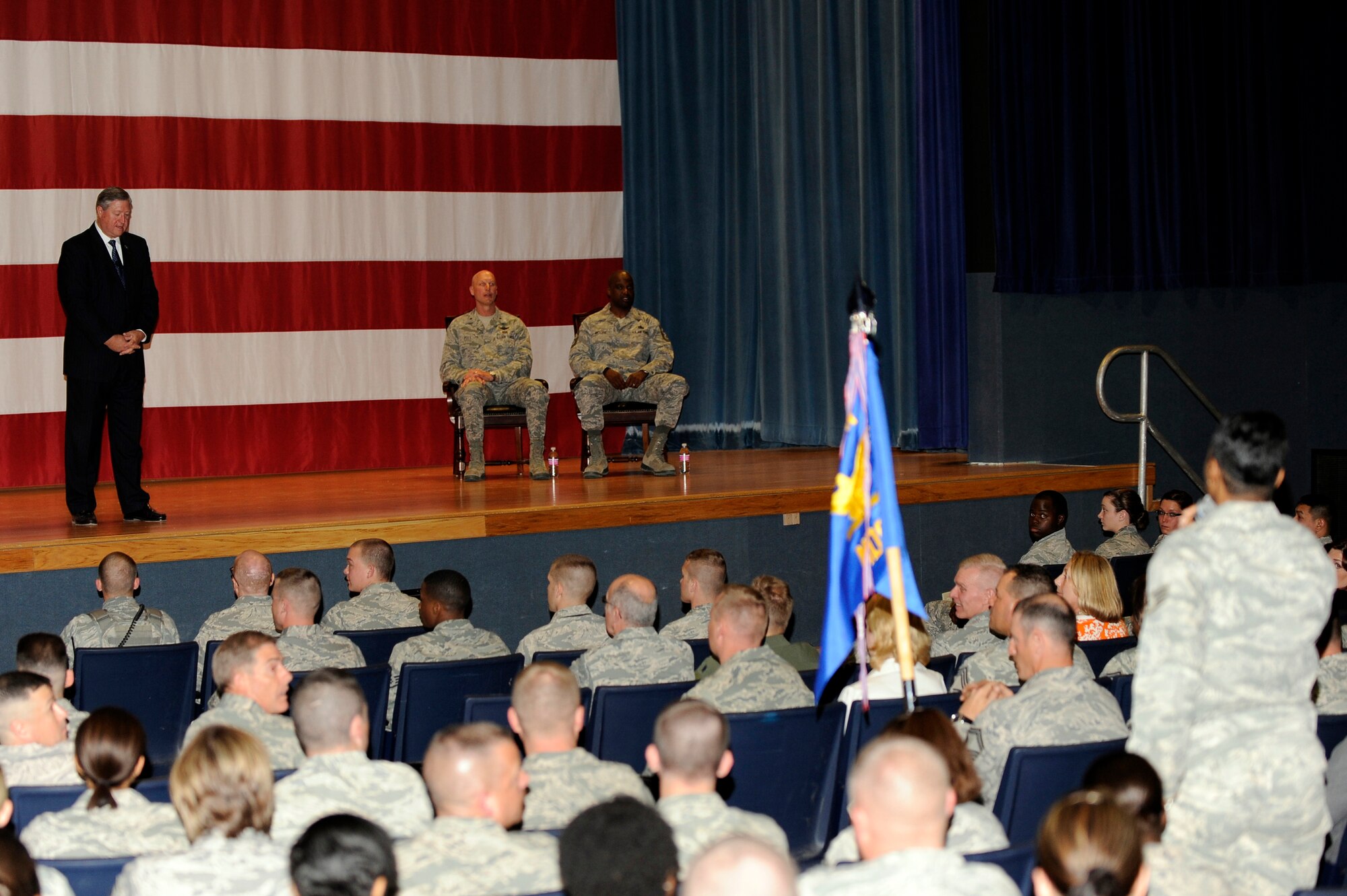 Secretary of the Air Force Michael Donley answers questions posed by an Airman during an all call for the Iceman Team at the base theater May 22, 2012, Eielson Air Force Base, Alaska. Donley spent time thanking the Airmen for their service and spoke about the recent force structure changes for the Air Force. (U.S. Air Force photo/Master Sgt. Jason Vaught)