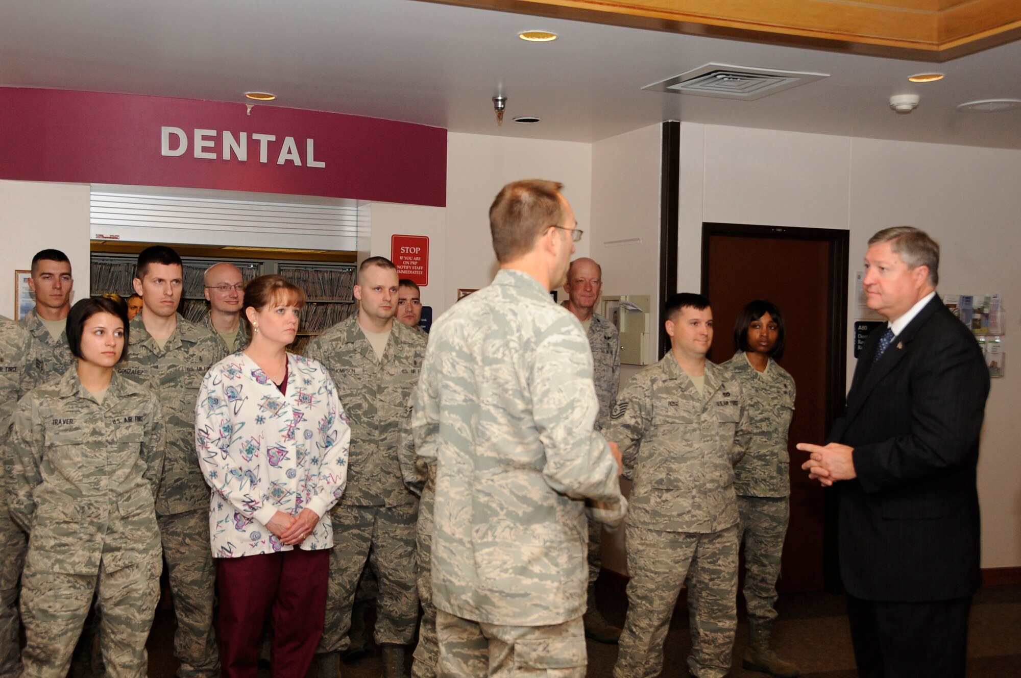 Col. Scott Sprenger, 354th Medical Group commander, introduces the Secretary of the Air Force Michael Donley to several outstanding performers from the dental clinic during his visit May 22, 2012, Eielson Air Force Base, Alaska. Donley visited the Airmen to personally thank them for their service and expressed that they are the driving factor behind a successful Air Force and its ability to complete the mission. (U.S. Air Force photo/Master Sgt. Jason Vaught)
