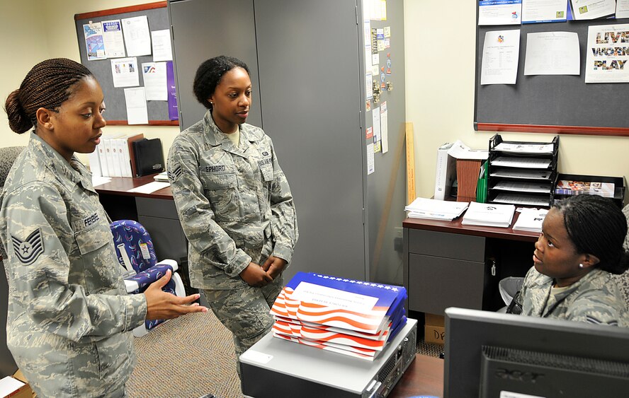 Airmen from the 482nd Fighter Wing get valuable information from the Airmen and Family Readiness Center at Homestead Air Reserve Base, May 24. The primary purpose of the Airmen and Family Readiness Center is to help personnel and their families stay mission ready by offering services such as family life education, relocation, money management, employment assistance, loan closets, and information and referrals. 
