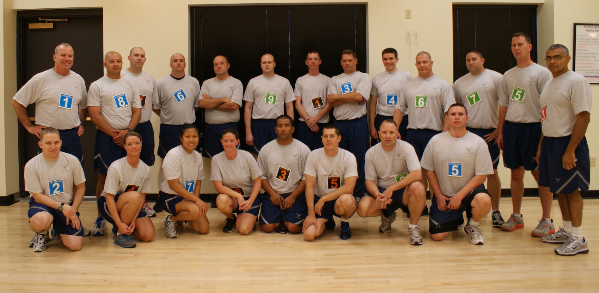 Brig. Gen. Michael A. Fantini posing with all the Airmen who took their physical fitness test on May 24, 2012 at Sheppard Air Force Base. All of the Airmen had just pinned on their numbers in preparation for the run portion of the physical fitness test. (U.S. Air Force photo/2nd Lt. Jerred Moon)