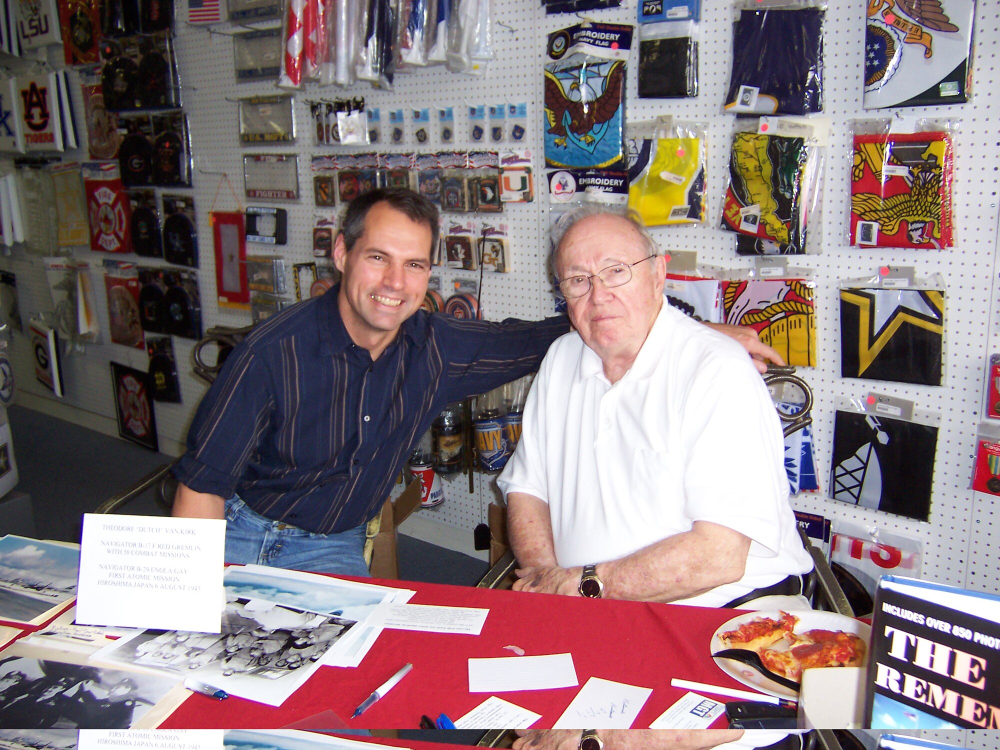 Lt. Col. Anthony Polashek, 514th Operations Group, visits with Theodore “Dutch” Van Kirk, the navigator and last surviving crew member of the Enola Gay, a B-29 Superfortress which dropped an atomic bomb on Hiroshima, Japan, during the final stages of World War II. Polashek encourages all Airmen to celebrate Memorial Day in a manner that recognizes the contributions and sacrifices of American servicemembers. (Courtesy photo)
