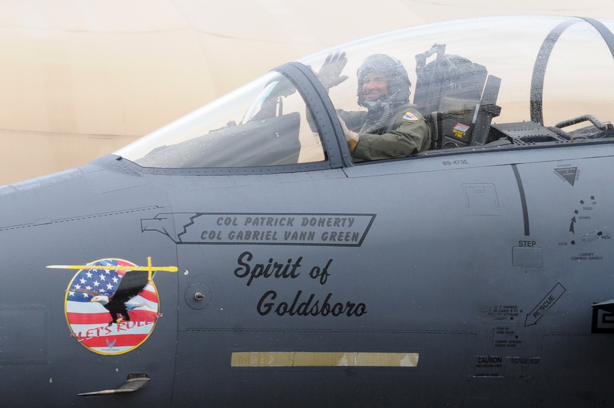 U.S. Air Force Col. Patrick Doherty waves to the crowd after completing his final flight in an F-15E Strike Eagle as the 4th Fighter Wing commander on Seymour Johnson Air Force Base, N.C., May 23, 2012. Doherty will relinquish command of the 4th FW to Col. Jeannie Leavitt in a change-of-command ceremony, June 1. (U.S. Air Force photo/Airman 1st Class Aubrey Robinson/Released)