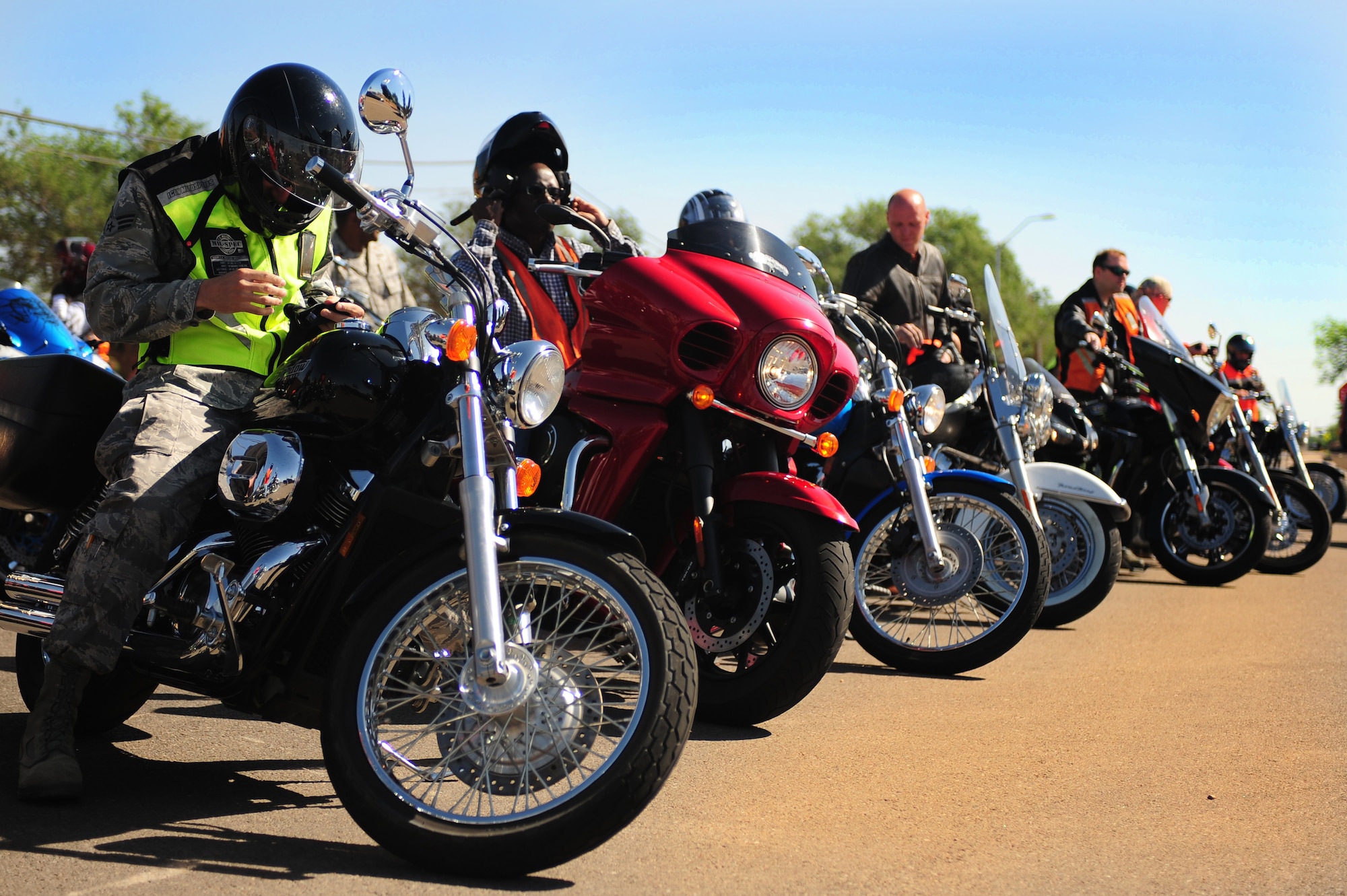 Air Commandos participate in a motorcycle ride during safety day at Cannon Air Force Base, N.M., May 18, 2012. More than 30 motorcycles zoomed across the flightline before concluding the ride in front of the wing headquarters building. (U.S. Air Force photo by Airman 1st Class Eboni Reece)  