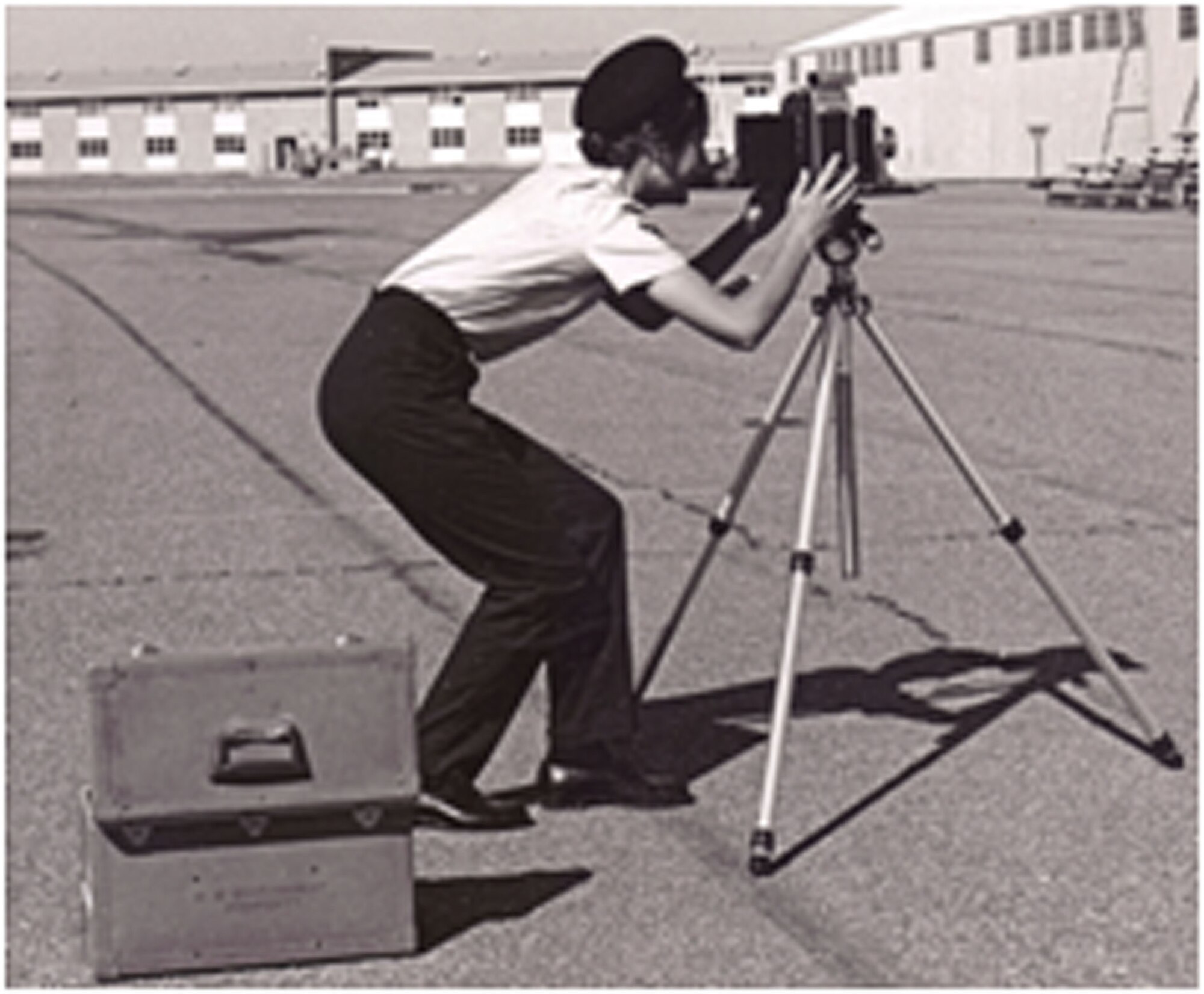 TRAVIS AIR FORCE BASE, Calif. -- Master Sgt. Peggy Kelly setting up for a photograph near the hangars at Tech School Lowry Air Force Base, Colo. (U.S. Air Force courtesy photo) 