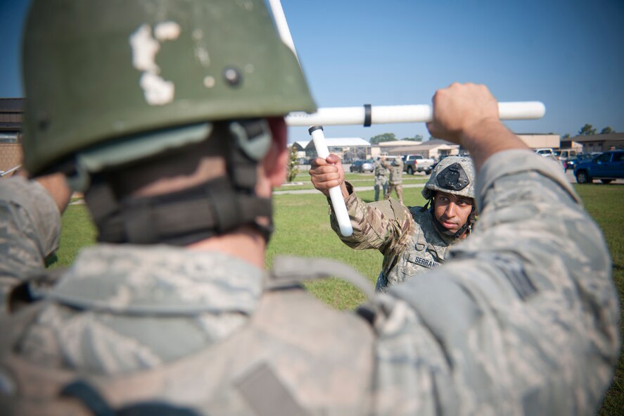 U.S. Air Force Airman 1st Class Daniel Serrano, 23d Security Force Squadron fire team member, participates in a set of block drills at Moody Air Force Base, Ga., May 23, 2012. Airmen practiced several blocking techniques including high blocks, low blocks, and weak and strong side blocks in preparation for a deployment to Afghanistan with the 824th Base Defense Squadron. (U.S. Air Force photo by Airman 1st Class Paul Francis/Released)
