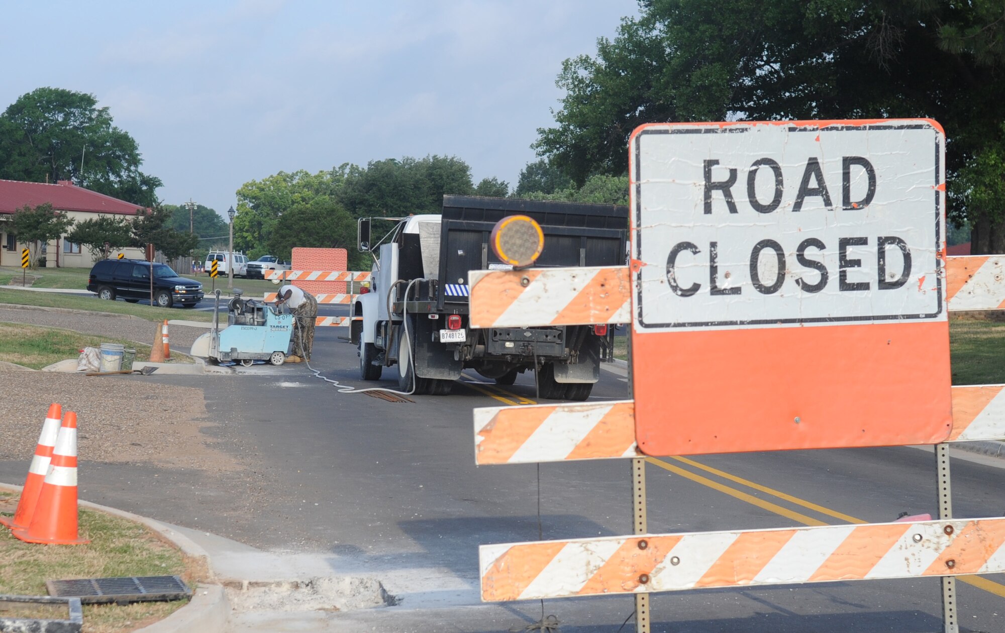 Signs are posted on Rickenbacker Street between Kenney Avenue and the Veterinary clinic informing motorists of road closures on Barksdale Air Force Base, La., May 24. The 2nd Civil Engineer Squadron will commence minor road repairs to improve pavement and drainage conditions. Construction is expected to take place from May 23 through 30.  (U.S. Air Force photo/Senior Airman Kristin High)(RELEASED)